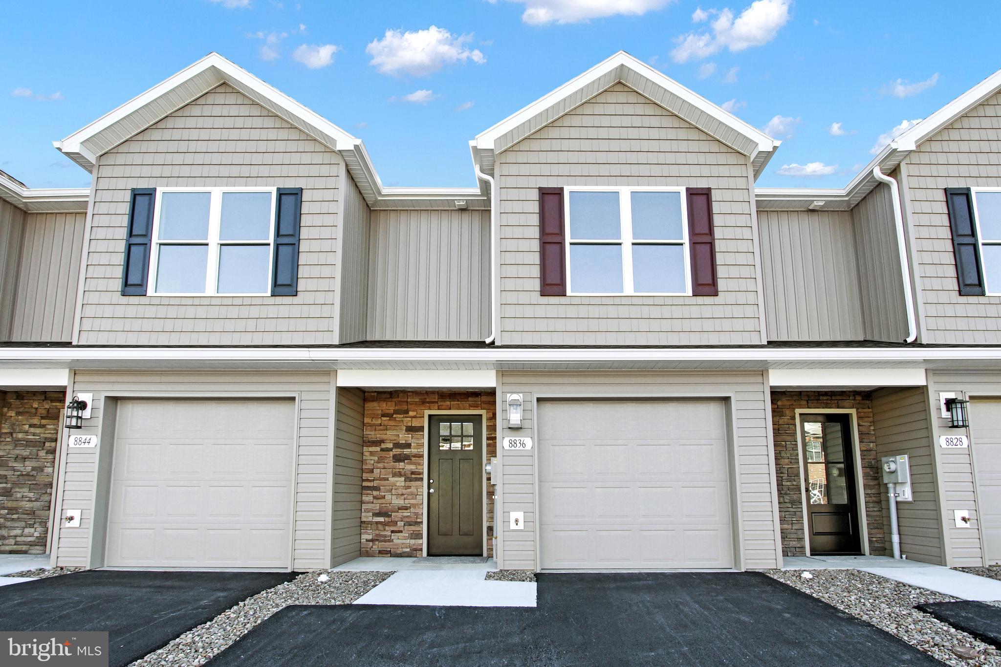 This brand-new townhome is custom-built in a quiet neighborhood with scenic views of the beautiful Waynesboro countryside! The highly sought-after Farmspring Estates offers the convenience of a nearby community pool, clubhouse, playground, dog park, walking trails, shopping, restaurants and an abundance of local amenities. The spacious home features three bedrooms and two and a half baths. The stunning eat-in kitchen includes brand-new stainless-steel appliances and ample granite countertop space. The main level also includes a half bath and an open living and dining area ready for you to make it your own. The upper-level features two oversized bedrooms, a convenient laundry area, and a full bath off the hall. The primary suite includes its own adjacent full bath and large walk-in closet. Carpeting, luxury vinyl flooring, ceiling fans, recessed lighting, central air and heat, and a rear patio all add to the appeal of this home. The finished attached garage offers a place to park outside of the elements and plenty of extra storage space. The paved driveway creates space for extra parking. Expected to be ready by 1/1/2025. Contact us today!