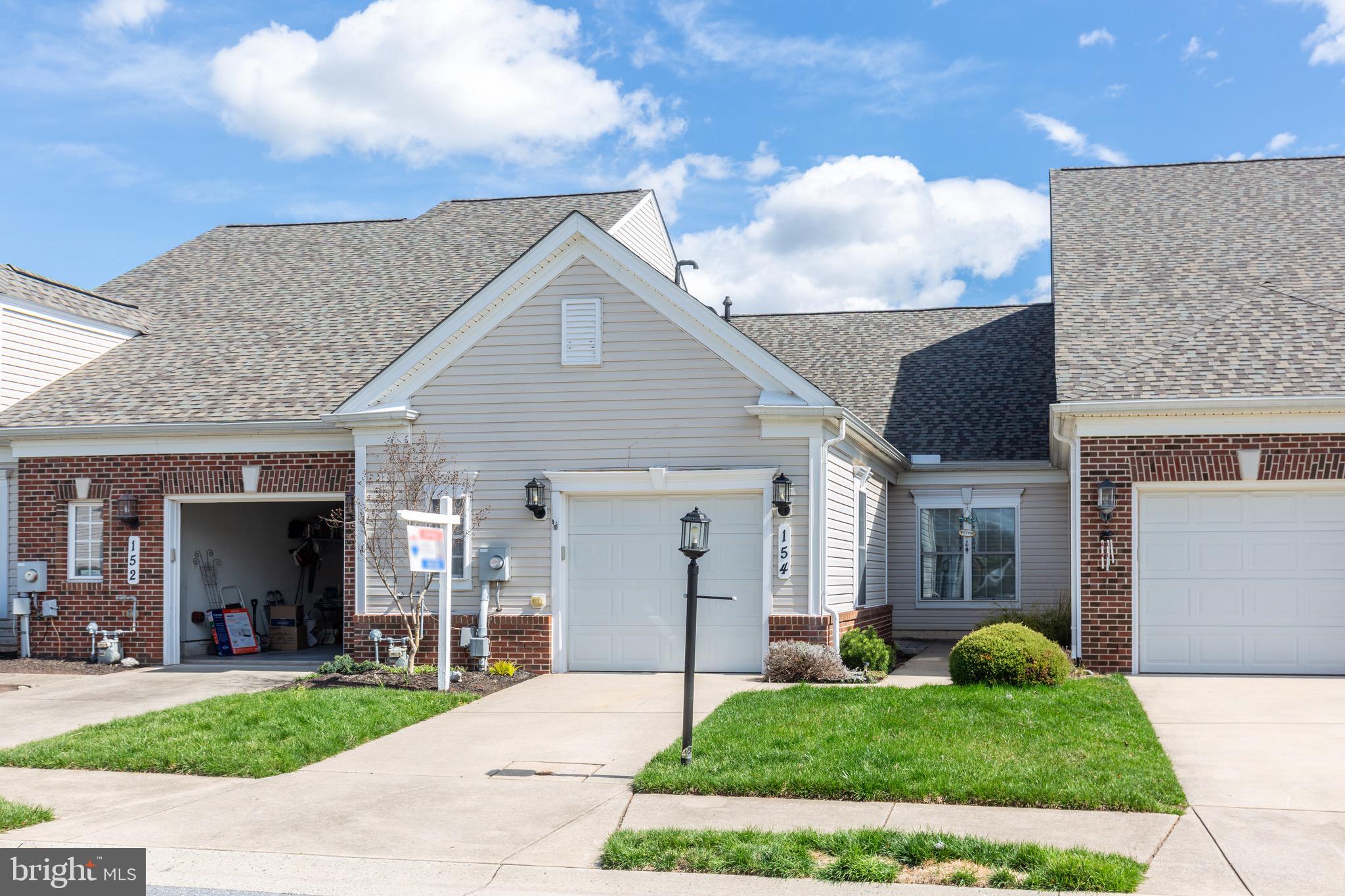 This beautifully maintained home in the amenity-rich 55+ community of Carroll Vista is ready for you to move right in and start enjoying a relaxed, active lifestyle. Featuring an open floor plan with soaring 10-foot ceilings and decorative picture-frame and crown molding, this home offers comfort and elegant details throughout. The kitchen is highlighted by oak cabinetry, a stylish granite countertop, and a stove with double ovens—now complemented by a new refrigerator installed in 2025. You’ll love the bright dining area that flows seamlessly into the spacious great room, perfect for entertaining family and friends. The carpeted Florida room provides a cozy sunny spot to unwind year-round. The guest bedroom features built-in shelving and offers flexibility to serve as a den, office, or hobby room. Additional peace of mind comes with a new roof and HVAC system, both replaced in 2025. Enjoy everything Carroll Vista offers, including a clubhouse, indoor and outdoor pools, fitness center, tennis, pickleball, bocce, virtual golf, 4-hole chip & putt, disc golf, gardens, walking paths, and more. Experience affordable resort-style living in a serene semi-rural setting—welcome home!