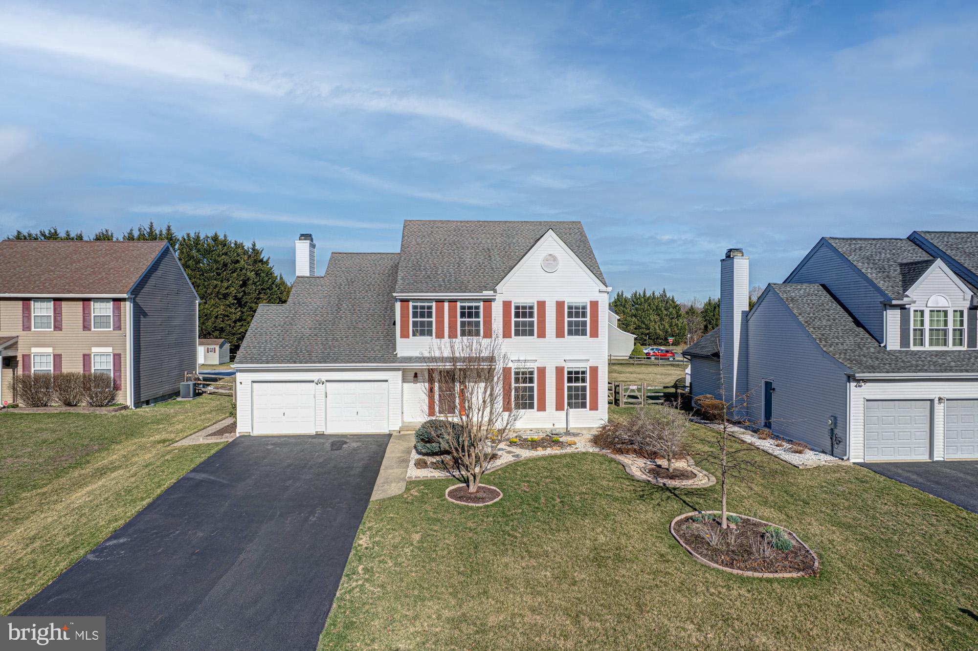 Welcome to the highly sought after community of Thornwood, where 21 Oakview Dr is waiting for you to call it home. This established and desired community is located in a prime location in Newark, just minutes from major roadways, access to I-95, close to University of Delaware campus, and this location is within radius for Newark Charter Schools!!! Community favorite restaurants and activities are just around the corner, and the options for shopping and entertainment are endless! From the moment you pull up to 21 Oakview, the stunning exterior and beautiful landscaping, already budding for spring, will draw you in, where the front entry with hardwood flooring will welcome you inside. To the left of the staircase, you'll find a guest bath and true mudroom/laundry that has been reconfigured for additional space, while to the right you'll find spacious formal living and dining rooms. Beyond the dining room, the kitchen will surpass all of your expectations, fully renovated to include upgraded cabinetry, granite countertops, beautiful stainless steel appliances, and a  stunning intricate tile backsplash. Sliding glass doors to the rear deck bring you out to the lovely fenced backyard, complete with hot tub and storage shed. The main level has not one, but two wood burning fireplaces, one just off the kitchen, and another in the MASSIVE great room addition that comes with radiant in-floor heating beneath the tile floor, soaring ceilings with intricate wood detailing and skylight, a beautiful stacked stone fireplace design, and dual sliding glass doors that provide both natural light and access to the rear deck. Upstairs, the primary suite is an owners dream, with TWO walk-in closets, a primary bath with oversized vanity and separate tub and shower. Three more bedrooms share a full hall bath on the second level. Don't forget to check out the finished basement, complete with a large living space, cedar closet, a separate space perfect for an office, workout room, or playroom, and unfinished workspace perfect for additional storage. With endless space, desirable upgrades, and a prime location, this home will be gone before you know it - don't miss an opportunity to make it yours!