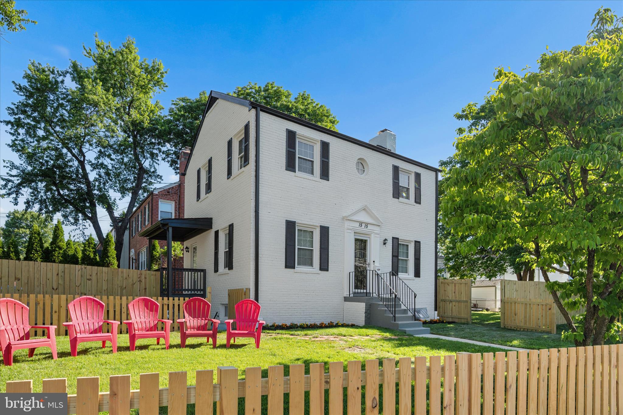 Beautifully renovated from top to bottom, this move-in-ready home offers the perfect blend of modern updates and timeless charm. The freshly painted brick exterior, fully fenced yard, and multiple outdoor living spaces create inviting areas for relaxing, entertaining, and enjoying the outdoors.

Inside, refinished hardwood floors flow throughout the main level. The updated kitchen features Samsung stainless steel appliances, a custom range hood, stunning zellige-inspired subway tile backsplash, and convenient access to the side yard. A separate dining room provides the ideal space for gatherings, while the living room is anchored by a cozy fireplace. A powder room completes the main level.

Upstairs, you'll find three bedrooms and a beautifully updated full bath. The spacious primary bedroom features two closets, while recessed lighting throughout adds a bright, modern feel. For added convenience, the upper level includes its own laundry area with a stacked washer and dryer.

The finished lower level offers exceptional flexibility and can function as a completely independent living space. Featuring a kitchenette,  laundry, living area, full bath, bedroom, private entrance, and dedicated outdoor space, it's ideal as an in-law suite, guest quarters, au pair suite, or potential income-producing apartment.

A thoughtfully renovated home with versatile living options, modern finishes, and exceptional indoor-outdoor functionality. Full list of updates attached.