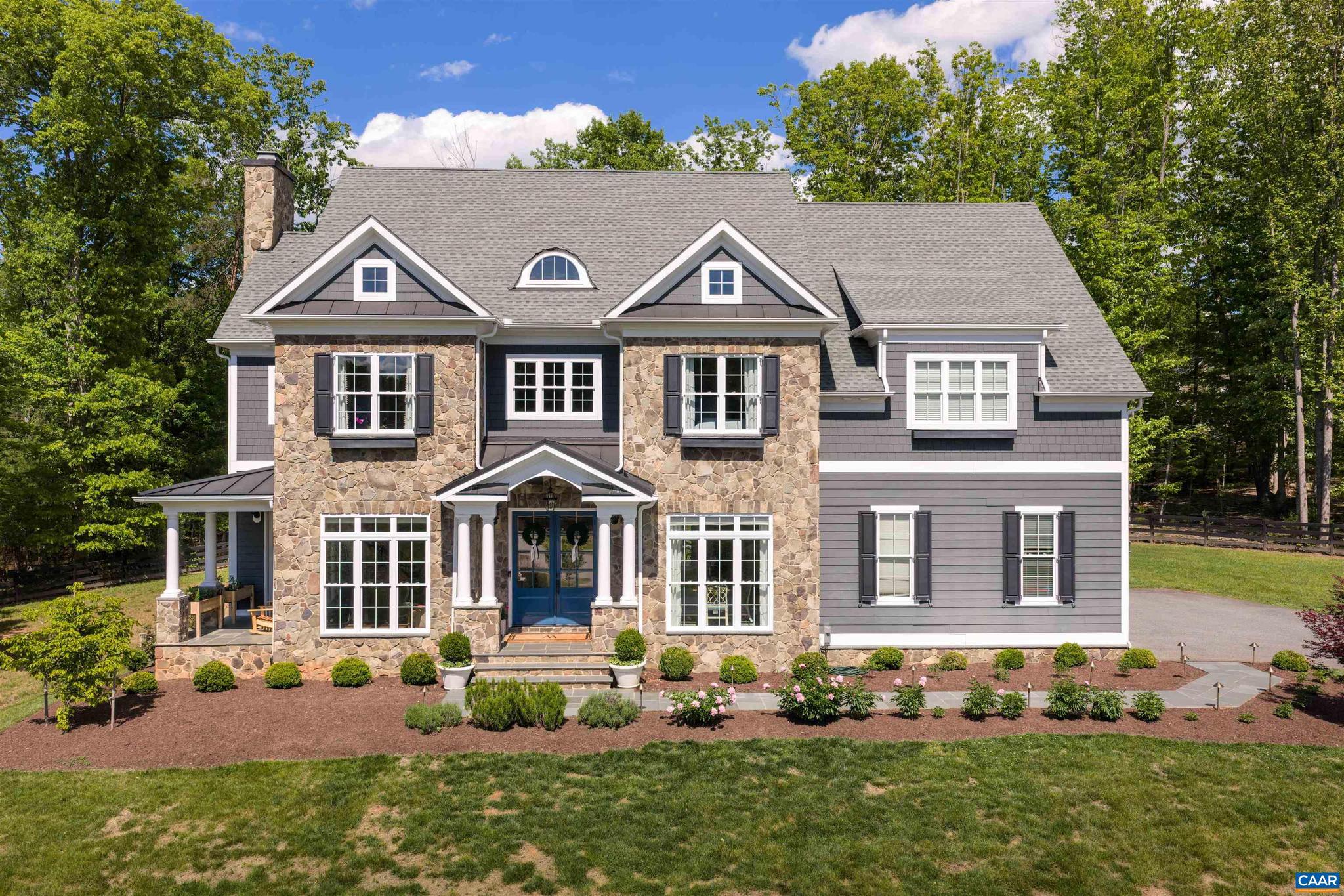 Located minutes from town in the coveted Ivy Elementary district, this like-new residence seamlessly blends everyday functionality with high-end luxury. The heart of the home is a newly renovated chef?s kitchen ? outfitted with Wolf double-range and steam ovens, Sub-Zero refrigerator and beverage fridge, and dual Miele dishwashers ? which flows effortlessly into a large family room, a light-filled study, and an elegant formal dining room. Upstairs serves as a private sanctuary, featuring an expansive primary suite with an adjoining sitting room and three additional bedrooms, each with an en-suite bathroom. Versatility defines the walkout terrace level, with its three multifunctional rooms, full bathroom, storage room, kitchenette with custom bar, and dedicated 500-plus-bottle wine cellar. Throughout the home, refined finishes include Farrow & Ball paint, Visual Comfort lighting, and custom California Closets. The exterior offers a private oasis with a spacious deck and patio set amidst extensive professional landscaping. Complete with two gas fireplaces, a new full-house generator, and two electric vehicle chargers in the three-car garage, this exceptional property offers turn-key perfection in a premier location.,Granite Counter,Wood Cabinets,Fireplace in Family Room,Fireplace in Rec Room