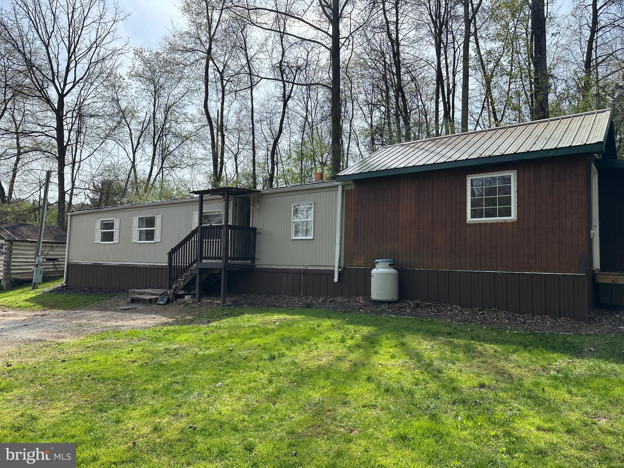 Nice rental home in a farm setting, Rough access roads, but passable.  Neighbors have active sheep and goat farm - working farm dogs at work patrolling property (very friendly). Small office room. Exterior 75x16. Kitchen - 14 x 8, gas range, refrigerator, dishwasher. Pantry 1 - 3 x 7. Pantry 2 - 9 x 6. Master bedroom - 10 x 14, walk in closet - 6 x 7.  Mini split & ceiling fan. Living room 17 x 14 - wood stove - use must be approved, mini split. Laundry room - 5 x 6. Office or storage room - 10 x 11 no closet. Bedroom 2 - 10 x 10, walk in closet - 5 x 4, window a/c unit and baseboard heater. Full bath with tub / shower combo - 7 x 4. - baseboard heater.

Water, sewer and trash included.Owner will mow if needed. Tenant will have to pay electric service. Woods stove may be used with approval if determined tenant is familiar with wood stove operations. Mini split (heating and a/c) in master bedroom and living room
baseboard heat in bathroom and second bedroom, window a/c in second bedroom
