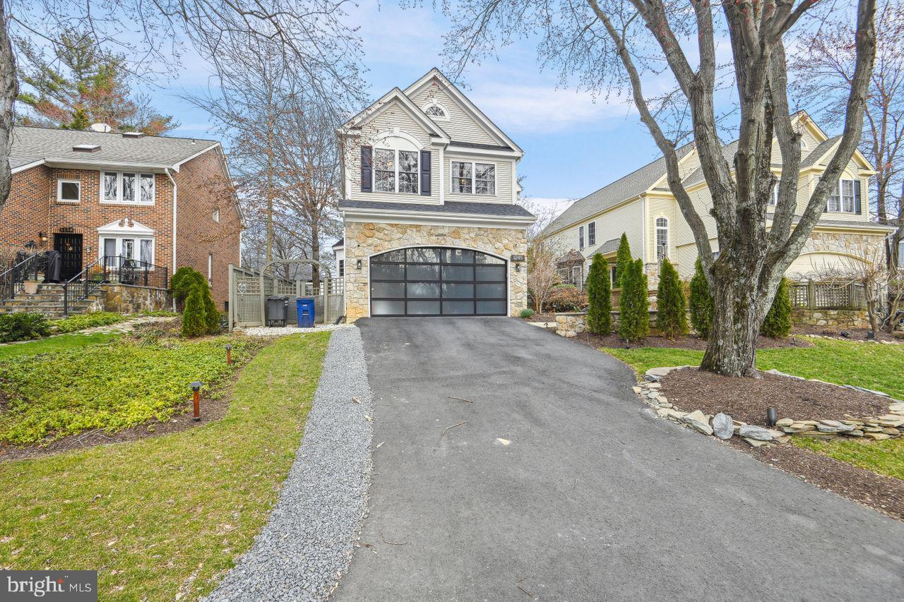 Welcome to your dream home! Perfectly located in the highly prestigious Beverly Manor community.  This house is also zoned to Langley High school.  This stunning 5 bedroom, 3.5 bath single family home offering luxury living at it’s finest, complete with a screened porch and two-car garage, including a charging station for your electric vehicles and an upgraded modern garage door. 
Inside, you’ll find a bright and airy open concept living area. Perfect for entertaining or relaxing.  Fully upgraded kitchen with 42” cabinets, quartz countertops, and stainless-steel appliance.  Top floor featuring four bedrooms with two full baths and a laundry room.  Lower level is a walk-up level featuring a large rec room, a 5th bedroom, and den/home office as well as a full bathroom. 
Step outside to an outdoor oasis featuring an oversized hot tub and pool combo, perfect for year-round relaxation and entertainment.  Host friends and family in style with a beautifully design outdoor entertainment area.