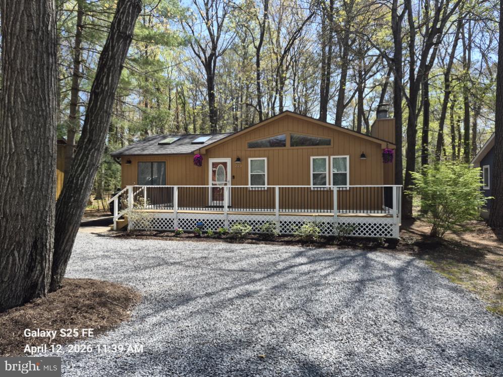 This inviting ranch-style home in the heart of Ocean Pines Resort offers the ideal combination of comfort, style, and convenience. Step inside to discover a bright, open floor plan featuring an updated kitchen and bathrooms. The home includes four spacious bedrooms and three full baths, with two bedrooms offering private en-suite bathrooms and a third full bath conveniently located off the hallway. Many recent updates have been completed throughout the home.
The cozy living room is warmed by an electric fireplace, creating a welcoming space to relax and unwind. Just outside, a large deck provides the perfect setting for outdoor dining and entertaining, while an outdoor shower—located to the left of the house—makes beach clean-up quick and easy. With ample parking and a front-load washer and dryer, this home is thoughtfully designed for easy, relaxed living.
Ideally situated near the community center, park, and playground, the property offers access to a wide range of amenities. For a small fee, residents and guests can enjoy five community pools, tennis courts, a marina, and an on-site golf course. Ocean City is just a short 15-minute drive away, where you can stroll the boardwalk, relax on the beach, or enjoy family-friendly attractions such as the Ferris wheel at Jolly Roger at the Pier.
Whether you’re seeking a full-time residence, a weekend retreat, or a vacation rental investment, this Ocean Pines gem delivers the very best of coastal living.

New updates to the property include:
New roof
Wi-Fi–enabled systems, including front door lock, hot water heater shut-off, main water shut-off, water monitor shut-off, and water leak detection
Ring cameras at the front and back doors
SimpliSafe security system with smoke detector
Two Wi-Fi–enabled light switches
Crawl space dehumidifier
Front lawn flower sprinkler system
Under-cabinet kitchen lighting
Wi-Fi–enabled thermostat