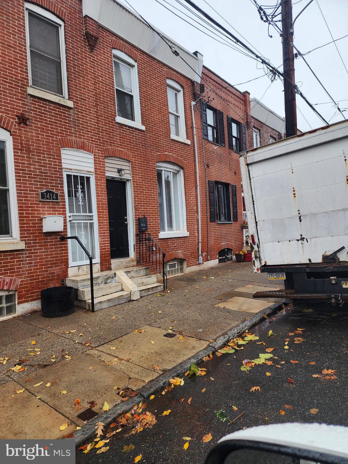 This charming row home offers 3 bedrooms and 2 full baths, fully renovated including new roof (2025). Featuring a modern renovation with a brand new kitchen and gleaming hardwood floors. Freshly painted throughout, it boasts a bright and inviting atmosphere. Additionally, there’s potential for a driveway in the rear, enhancing convenience and functionality.