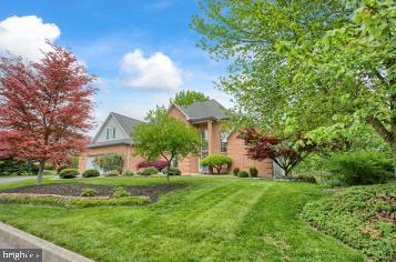 A TOTAL GEM! FANTASTIC 2 STORY ON .40 ACRE LOT THAT BORDERS COLONIAL GOLF AND TENNIS, AND IS BEAUTIFULLY APPOINTED WITH THE PERFECT LANDSCAPING! TOTAL SQ FOOTAGE IS ESTIMATED BUT VERIFIED WITH THE BUILDER (YINGST HOMES). THE 4,000 TOTAL SQ FEET OF LIVING SPACE IS WELL DESIGNED. THERE IS AN OPEN FLOOR PLAN FEELING WITH VAULTED AND TWO STORY CEILINGS. THE LARGE KITCHEN AND BREAKFAST AREA OPENS TO A NEWLY REDONE 12 X 24 MAINTENANCE FREE DECK AND IS HIGHLIGHTED WITH NEWER GRANITE COUNTERS AND CUSTOM JENN AIRE COPPER ACCENTED APPLIANCES. THE FIRST FLOOR MASTER IS SPACIOUS WITH A COMPLETELY REDONE MASTER BATH! THE UPSTAIRS BEDROOMS ARE VERY GENEROUS, ESPECIALLY THE 4TH BR, IT CAN EASILY ACCOMODATE 2 CHILDREN W/EXTRA ROOM FOR ALL NECESSITIES! THE LOWER LEVEL IS WALK OUT TO A 11 X 16 PATIO, WAS FINISHED BY BUILDER, BAR AREA WITH CABINETRY AND POWDER ROOM. HOME HAS DUEL ZONE ECONOMICAL GAS HEAT, ALL NEW SECOND FLOOR CARPET, 3 X 12 CEDAR CLOSET. EXTREMELY WELL MAINTAINED HOME WITH GREAT LANDSCAPING..... THIS IS A TERRIFIC ONE OWNER PROPERTY. A PLEASURE TO INSPECT.