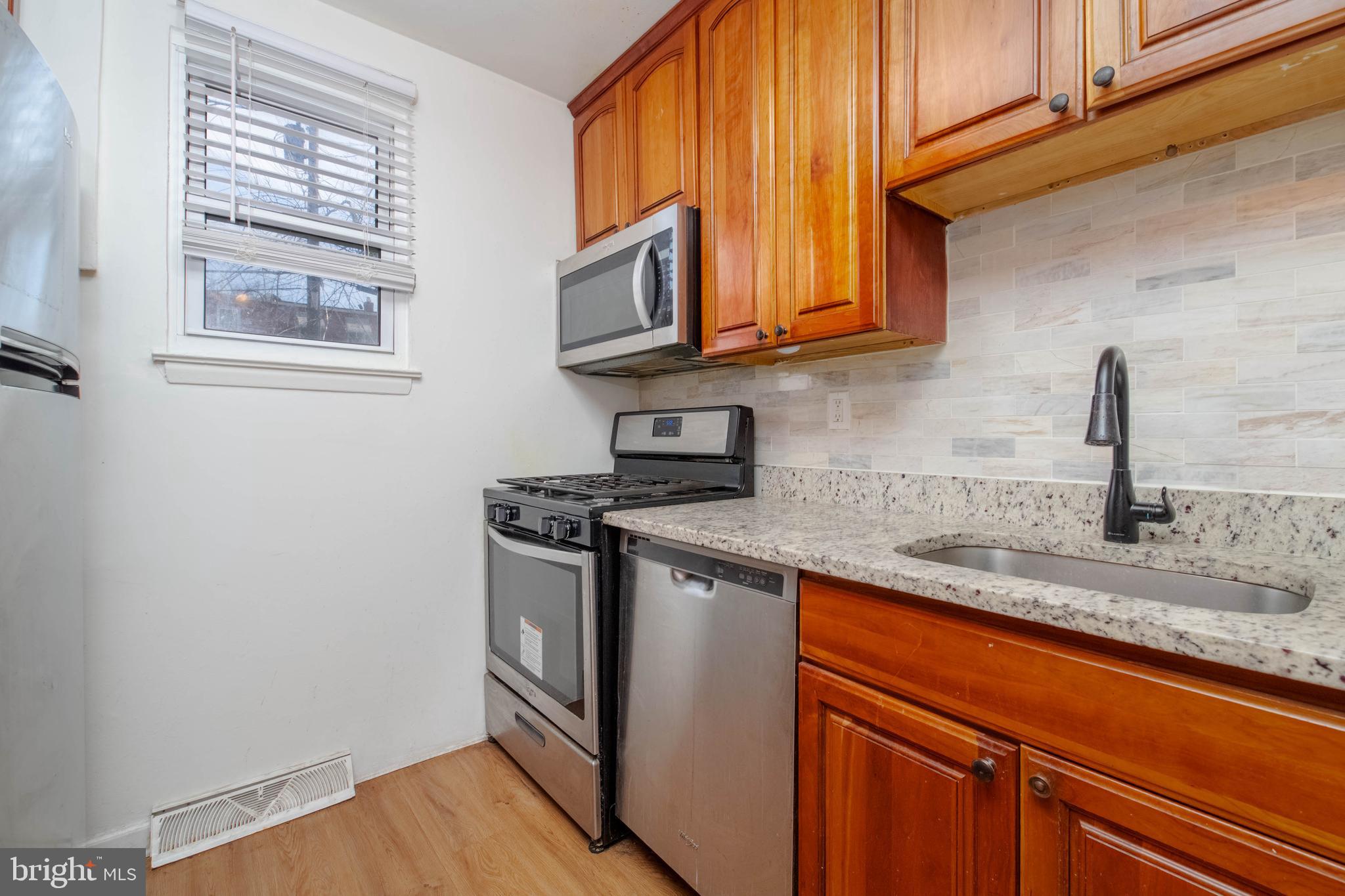 Welcome to 4409 Falls Bridge Drive. This beautifully updated Highpointe condo, located in the heart of Baltimore, offers exceptional value. Featuring two spacious bedrooms and one full bath, this home is move-in ready or an excellent addition to your investment portfolio. 
Recent updates include new flooring throughout and stainless steel appliances. Major mechanicals have also been updated, with a water heater approximately 5 years old and a furnace just 5 months old. The building offers the added convenience of in-building laundry and access to a community pool. 
Ideally situated with easy access to Hampden, Medfield, Roland Park, Towson, and Downtown Baltimore, commuting is easy with nearby access to the JFX and Light Rail. Located close to Loyola University Maryland and Notre Dame of Maryland University, this condo combines comfort, convenience, and outstanding value.