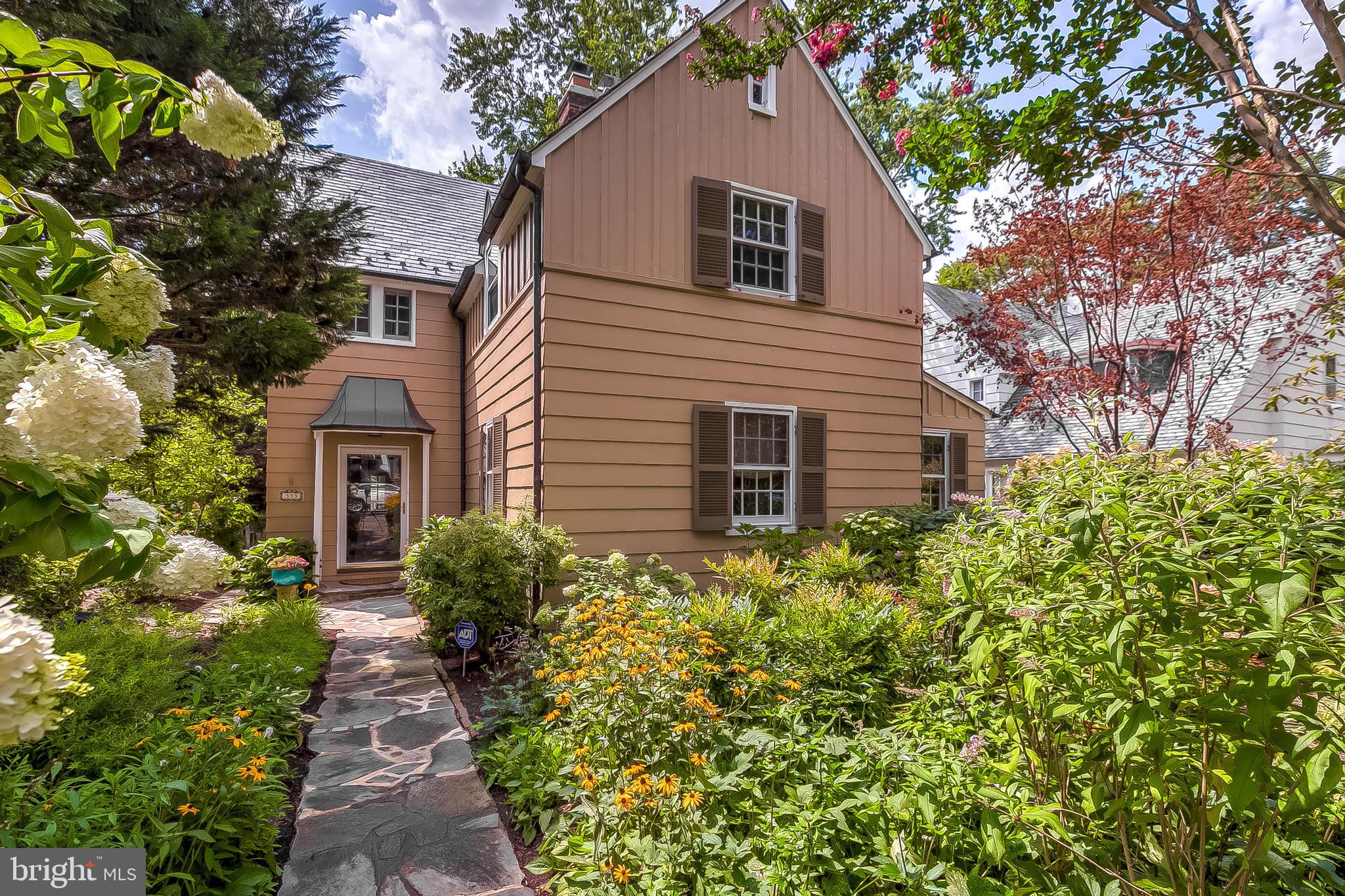 Not your everyday center-hall colonial, this lovingly cared for and updated home has a floor plan that beckons you from room to room and will enchant you from the start.   The stone front walkway, flanked by mature landscaping designed for multi-season interest, welcomes you to an entry hall featuring a wood paneled stairway along with access to the living and dining rooms and kitchen.   The large living room features a wood-burning fireplace and custom built-ins and opens to a coveted home-office with French doors for privacy. The heart of any home, the updated kitchen has room for all with a built-in banquette on one end and family room on the other.   Both the family room and dining room provide gracious connection to the roomy  patio with space for both dining and lounging.  The garage has been converted to flexible space suitable for studio, play or work-out space and includes a dedicated split HVAC system.    The second floor offers three bedrooms and two fully renovated baths, including an en-suite master.   Bedroom four, on the third floor, would also make an excellent home office.   The lower level upholds the attention to detail and quality workmanship with a second family room, half bath and laundry/utility space.   333 Tunbridge Road is sure to please the choosiest buyers and is ready for its next lucky owner. DR chandelier excluded.  $150 one time HOA fee.