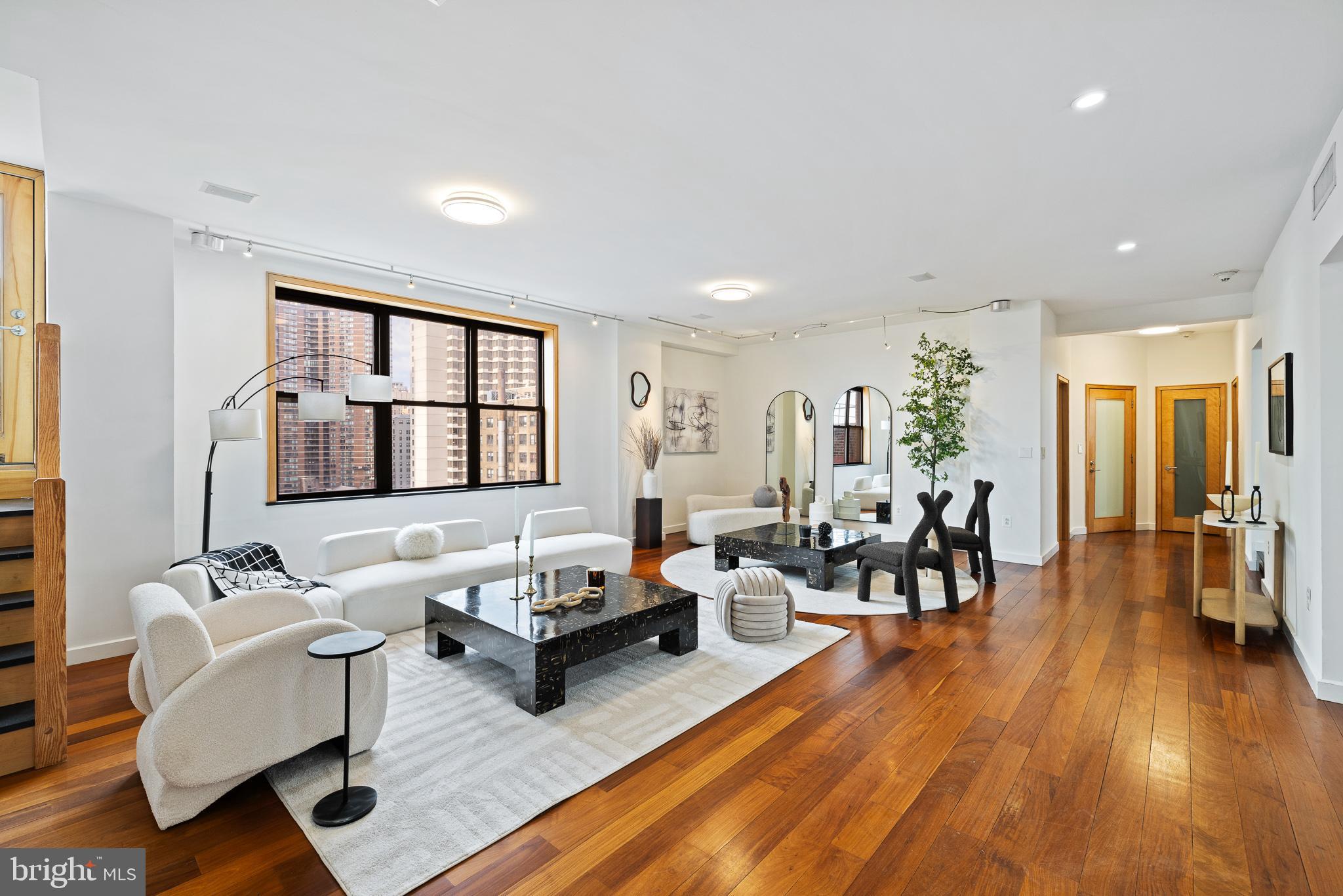 ENJOY VERY LOW TAXES & HUGE OUTDOOR SPACES!  Welcome to the largest unit, Penthouse 14A at the Lenox, where luxury living reaches new heights in the heart of Philadelphia's vibrant Washington Square West neighborhood. This expansive 2424 Sq. Ft. residence boasts a modern open floor-plan, featuring 4 bedrooms and 3.1 bathrooms. The crown jewel of this home is the rare, nearly 2000 Sq. Ft. of outdoor space, highlighted by a sweeping wrap-around terrace offering breathtaking, panoramic, unparalleled views of the city skyline.
Step inside to discover a thoughtfully designed all new interior that seamlessly blends elegance with functionality. From the gourmet kitchen with state-of-the-art appliances to the spacious living areas bathed in natural light, every detail speaks of sophistication and comfort. The primary bedroom is separated from the additional bedrooms, giving exceptional privacy.
Located at the prestigious Lenox, residents enjoy 24/7 doorman service, secured key-access elevator only available to the Penthouse Level, Gated Parking and a prime location in one of Philadelphia's most sought-after neighborhoods. Whether entertaining guests alfresco on the terrace or enjoying a quiet evening overlooking the twinkling lights of the city, Penthouse 14A offers a lifestyle of luxury and refinement.
Situated just steps from the city’s best restaurants, theaters, shops, and the Avenue of the Arts, this penthouse offers unmatched convenience. Proximity to Jefferson and Pennsylvania Hospitals, as well as multiple public transportation options, enhances its central appeal.
Don’t miss this rare opportunity to own a piece of Philadelphia’s skyline in one of the city’s most sought-after locations. Schedule your private showing today and experience the pinnacle of urban living.