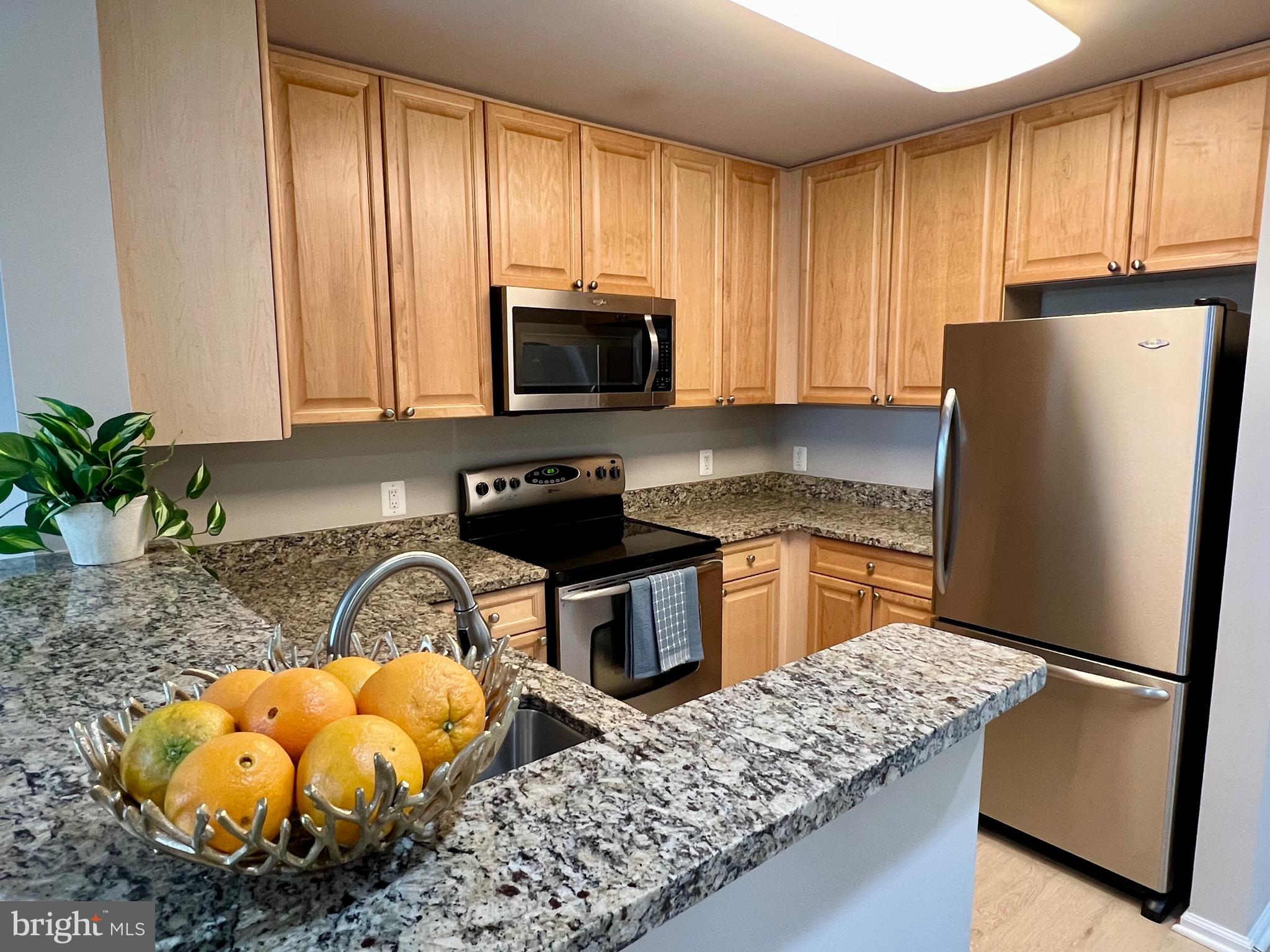 Nestled in the prestigious Sterling at the Metro, this exquisite 1BR/1BA condo (822 sq. ft.) offers a harmonious blend of comfort and high-end urban living. Brand new carpet and laminate flooring. Experience an open-concept layout filled with natural light, featuring a gourmet kitchen with built-in appliances and a serene primary suite with a spa-like bath and walk-in closet. Enjoy your morning coffee on the private balcony or take advantage of the building’s premier amenities, including a concierge, fitness center, outdoor pool, and club room. Located in the highly sought-after Walter Johnson HS cluster and just a 3-minute stroll to the North Bethesda Metro, Pike & Rose, and premier dining—this is more than a home; it’s a lifestyle embraced.  Some photos in this listing have been virtually staged with décor and furniture to illustrate the furniture layout options.