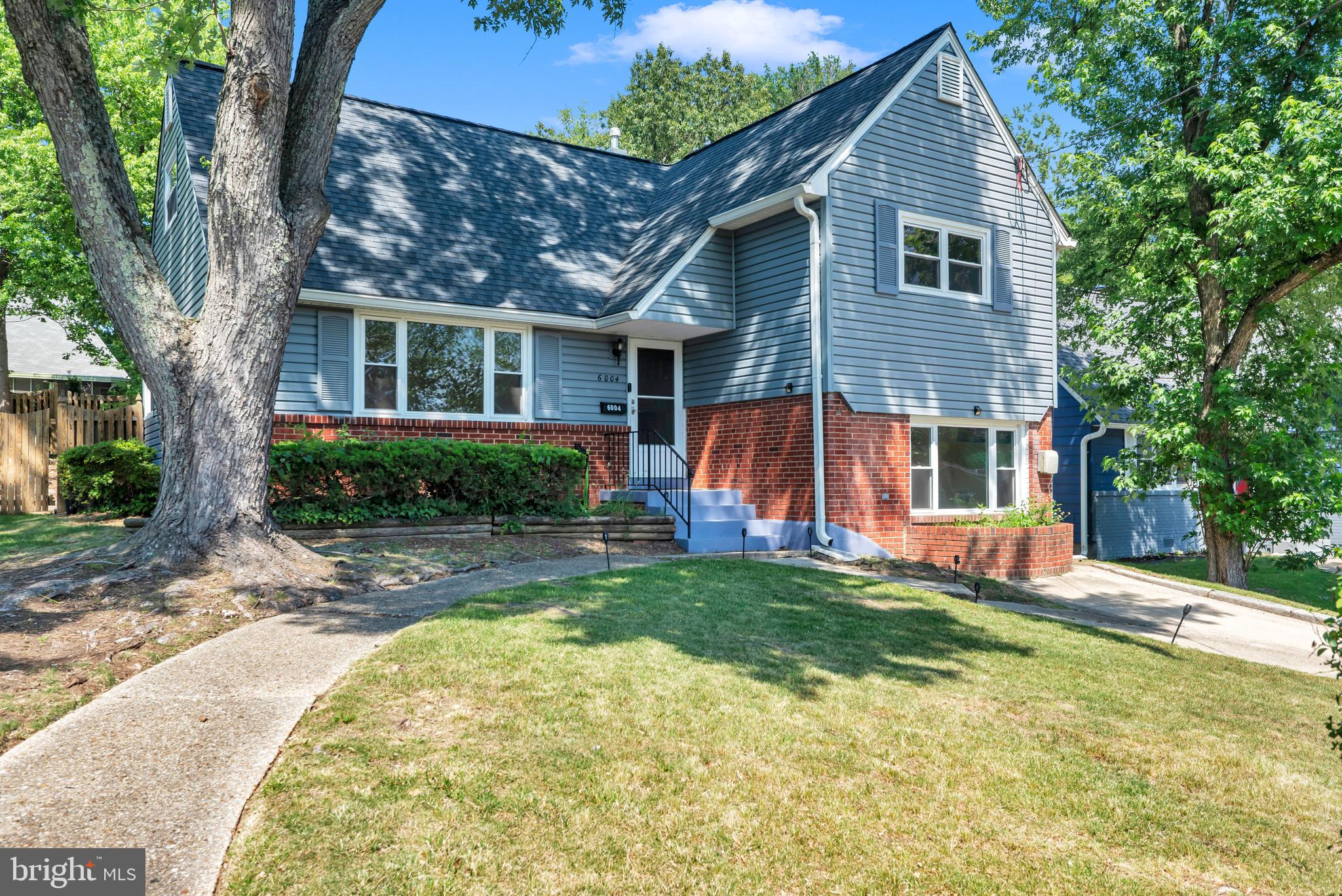 4-level renovated home with a fenced backyard, hardwood oak flooring throughout, fresh paint, and recessed lighting. Bright and spacious with beautiful hardwood floors, newer HVAC, hot water heater, windows, maintenance-free siding, and roof. Updated kitchen featuring granite countertops, stainless steel appliances, separate dining room, and open floor plan. Renovated bathrooms, enclosed rear porch, rear deck, and fully finished basement with bathroom, laundry, and ample storage. Driveway plus plenty of street parking. Conveniently located near shops, major commuter routes, public transportation, and within walking distance of the new Purple Line. Great value—don't miss this opportunity!