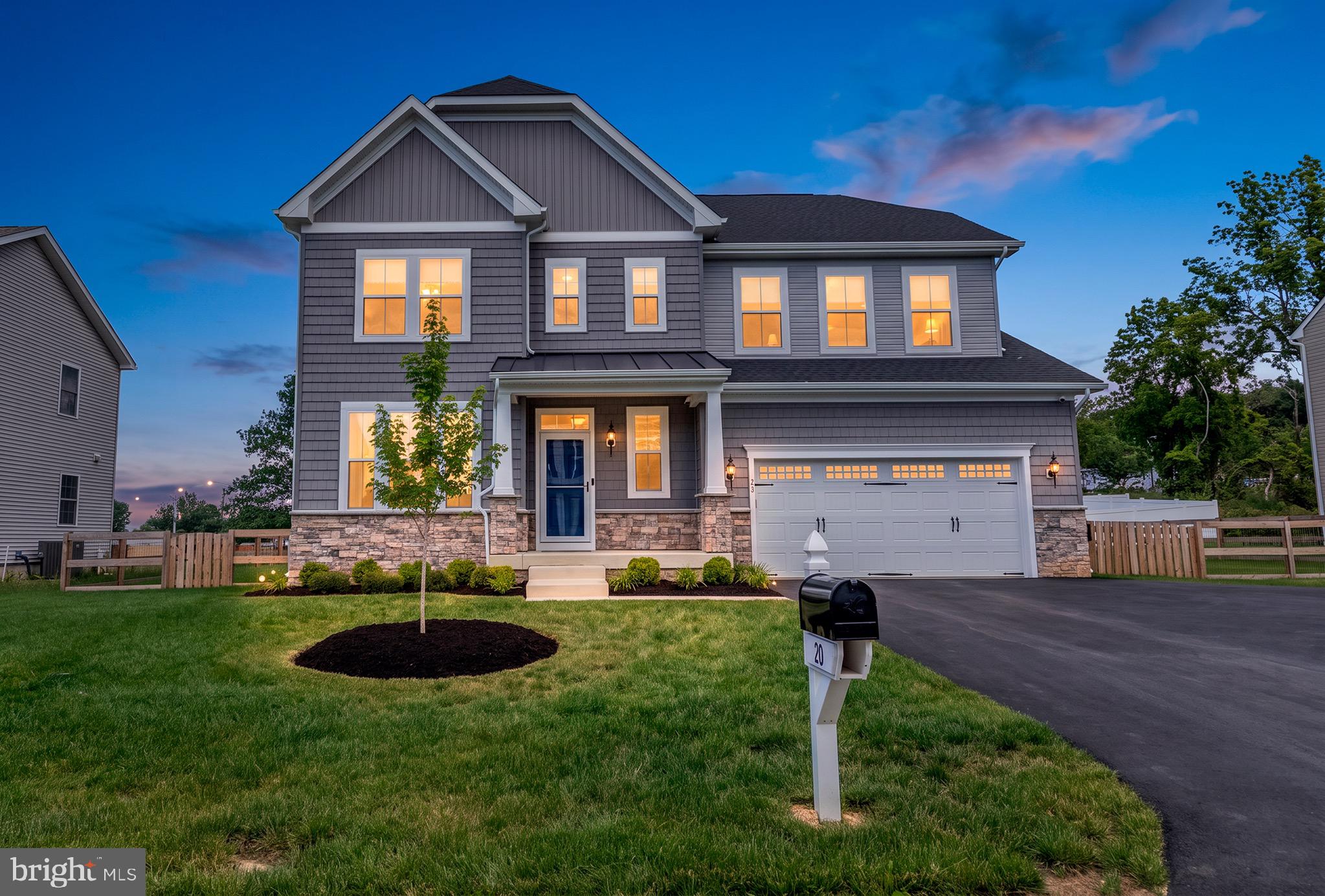 Welcome to a home that is  just two years young and significantly better than new. Avoid the wait and extra expense of new construction; this pristine property already features the premium upgrades and meticulous details that builders often leave out. The seller has invested  over $100,000 in additional enhancements since moving in, making this the perfect place to call home. The care poured into this property is evident the moment you step inside.
The main level is designed for effortless daily living and entertaining, with a spacious functional open layout. A dedicated main-level office space provides the perfect quiet retreat for remote work. At the heart of the home is a chef-inspired kitchen featuring gleaming quartz countertops, an upgraded appliance package with induction cooktop, a massive central island, and a separate eat-in area for a casual dining table. The generously sized walk-in pantry accommodates a deep freezer too.

Upstairs, the intelligent layout continues with four spacious bedrooms and two full bathrooms. There is also an upper-level laundry room, keeping chores right where the clothes are.

The fully finished lower level expands your living space even more. This walk-out basement features a large family room, a versatile bonus room perfect for guests or a gym, a full bathroom, and a spacious storage room to keep you organized.

Step outside from either level into your private, fenced backyard. Outdoor living has been elevated to a luxury standard with a brand-new TimberTech composite deck and a beautiful screened-in room. Thoughtfully detailed with low-voltage lighting and convenient drink rails, it is the ultimate setting for warm-weather relaxation.

The current owners expanded the driveway to be able to hold multiple vehicles. Step inside the garage and you will find a car enthusiast’s dream, complete with premium Swisstrax tile flooring,  NewAge storage cabinets and a top-tier Grizzl-E 40A EV charger.

A comprehensive tech and efficiency package includes an Ecobee Smart Security system, smart switches, a smart lock, and a smart thermostat. The entire home is fully wired with Cat6 Ethernet and is pre-wired for a Dolby Atmos surround sound setup with ceiling speakers.   Best of all, an upgraded hybrid heat pump water heater ensures maximum energy efficiency and lower utility bills.

Situated in an unbeatable, highly walkable location, you are just a short stroll from the local library, excellent shopping, and fantastic dining. You can even walk to the state fairgrounds for local events and entertainment.

This home is completely turnkey, fully loaded, and ready for its next chapter.
