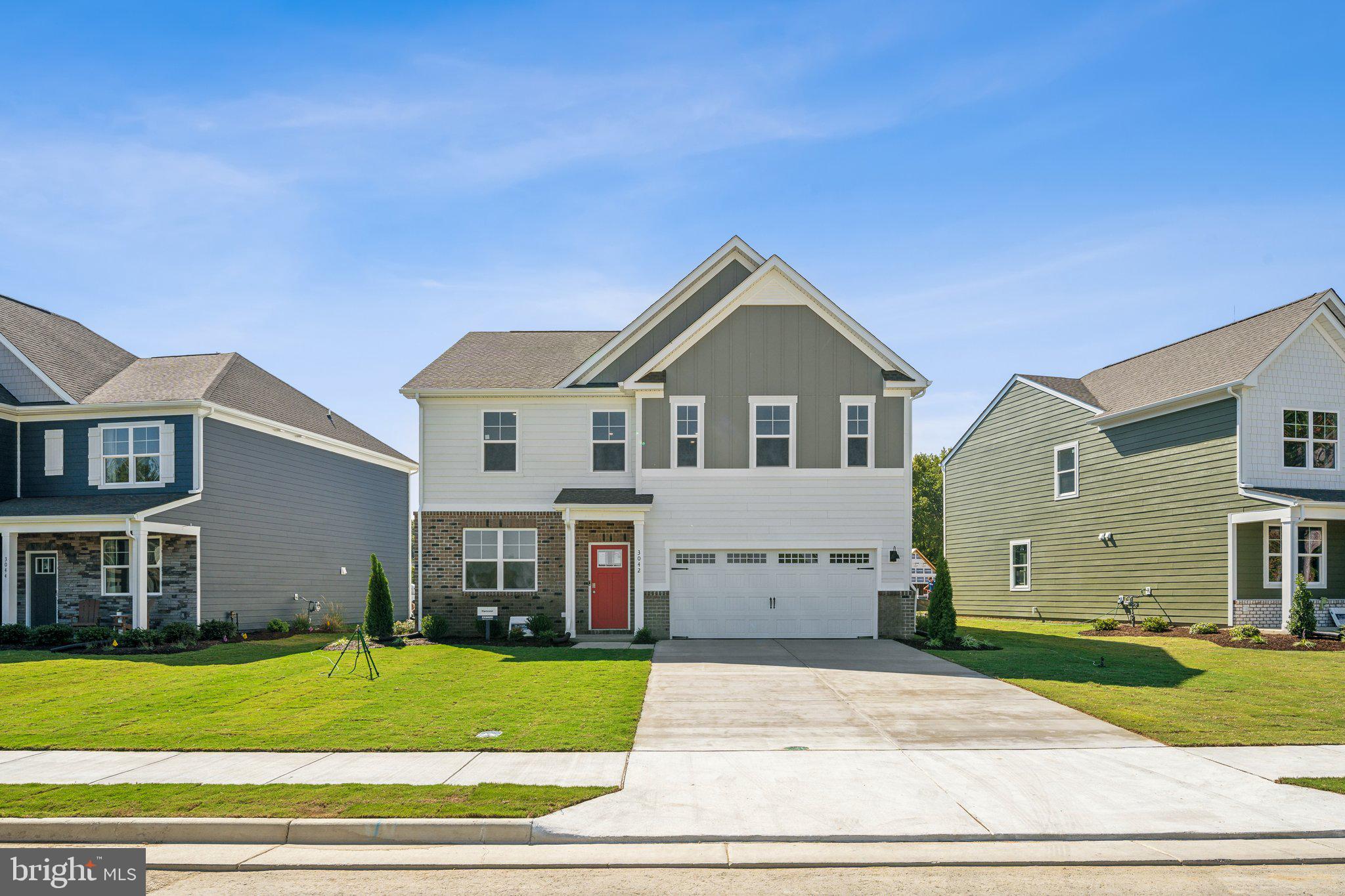 Now selling in the newest section of the Ladysmith Subdivision! Welcome to the 2804 sq ft Hanover model, offering a modern open-concept living space designed to meet your family’s needs. The main level features a combined family room and casual dining area, creating a spacious area perfect for entertaining and daily activities. The chef-inspired kitchen boasts a large center island, a walk-in pantry, and ample counter space, making it ideal for cooking and gathering. A formal dining room and office provide additional spaces for both work and relaxation, while a convenient powder room completes the main floor.

Upstairs, an additional living space provides even more flexibility, whether you need a home office, play area, or entertainment room. The primary suite is a true retreat, featuring a large walk-in closet and a luxurious bathroom with separate vanities and a private water closet. The second floor also includes a laundry room, a full bathroom, and three additional spacious bedrooms, ensuring plenty of space for the whole family.