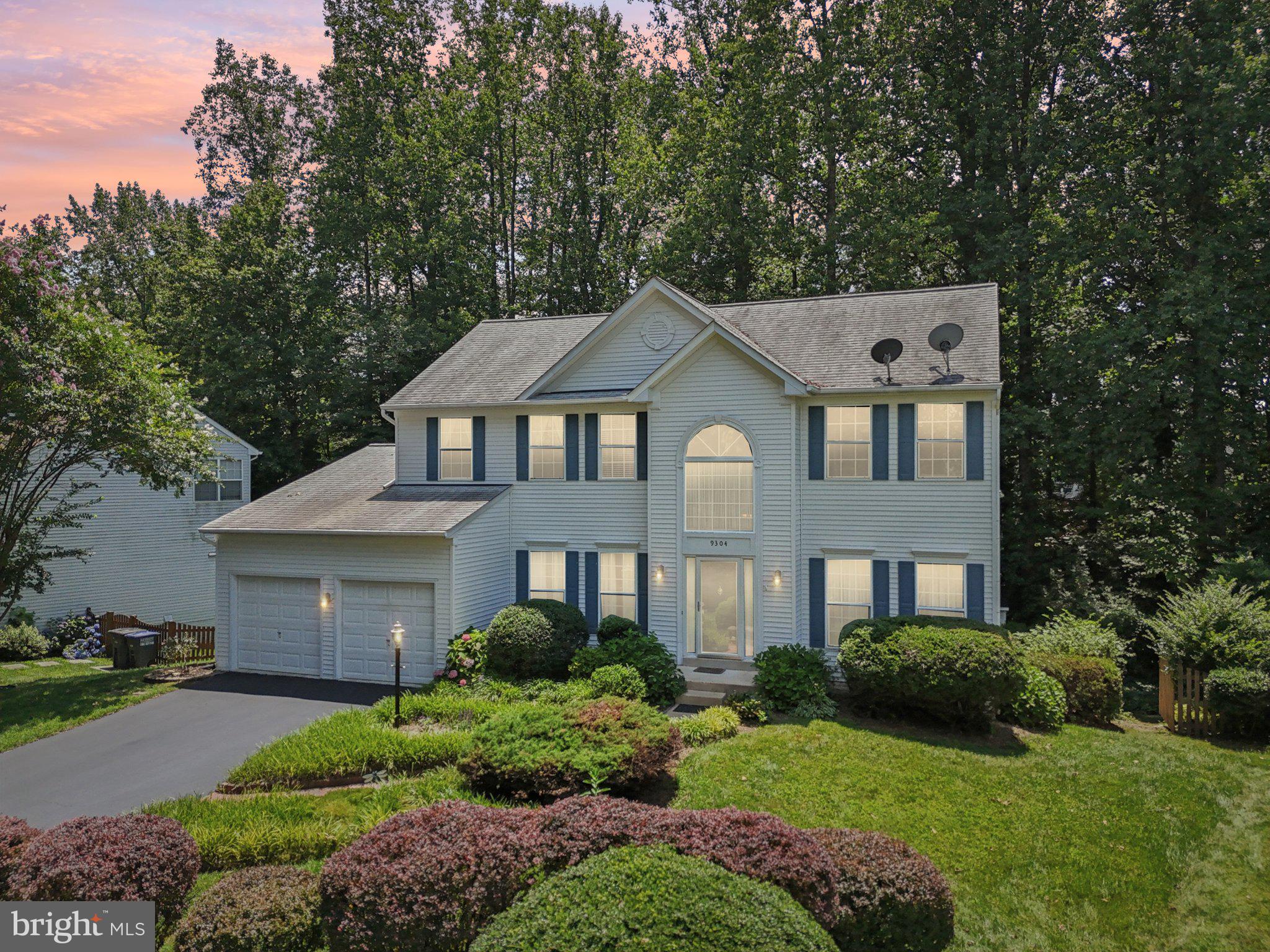 Price Reduced! Welcome to 9304 Bradley Court, a charming and thoughtfully updated 4-bedroom, 2.5-bathroom home tucked away on a peaceful cul-de-sac in Manassas Park. Blending timeless character with smart, modern updates, this residence offers both comfort and personality—perfect for buyers seeking a home with lasting quality and unique charm.

Inside, the professionally remodeled kitchen (2023) features stainless steel appliances, soft-close and pull-out cabinetry, luxury vinyl tile flooring, stylish light fixtures, and five additional cabinets for expanded storage. Designed by a professional organizer, the layout is both beautiful and highly functional. Just off the kitchen, the dining room showcases a one-of-a-kind mural inspired by the historic village of Waterford—creatively including a hand-painted image of this very home, giving the space an artistic and deeply personal touch.

The family room and breakfast area also feature luxury vinyl tile flooring (2023), while all four bedrooms were updated with brand-new carpet in May 2025. The primary bedroom includes gunstock oak hardwood flooring (2014), and the dedicated home office features new flooring as well. The primary bathroom was fully renovated in 2014 with updated cabinets, countertops, double sinks, a walk-in shower, and new flooring—blending comfort and elegance. A stunning clawfoot soaking tub adds a touch of classic luxury to the space. Both the kitchen and bathrooms are equipped with soft-close, pull-out cabinetry for a unified, high-end finish throughout. Crown molding adds classic style, while a gas fireplace provides a cozy, welcoming atmosphere in the main living space.

Just off the kitchen, you’ll find a bright and enclosed sunroom, perfect for enjoying your morning coffee or relaxing year-round. Beat the heat with a wonderfully shaded backyard, which offers privacy, serenity, and a detached shed for extra storage or workspace.

A standout feature of the home is the large, unfinished walkout basement—already plumbed for a bathroom and equipped with a utility sink. This expansive area opens to an attached lower porch and offers tremendous potential for future living space, whether you envision a guest suite, entertainment room, or workshop.

Practicality meets peace of mind with a two-car garage, providing ample parking and additional storage. The exterior has been meticulously maintained and updated. The main roof was replaced in 2018 with CertainTeed XT-25 shingles (25-year warranty), and the shed roof was replaced in April 2025. A Gutter Helmet system was installed in 2019, with upgraded and replaced gutters in 2011 and 2013. Additional exterior improvements include a resized kitchen window and matching vinyl siding (2011), as well as drywall installation in the sunroom (2012).

Energy efficiency upgrades abound, including a Carrier Infinity Two-Stage Air Conditioner and Infinity 80 Furnace (2019), R-49 attic insulation, foam insulation in soffits and joists, a solar attic fan, and an insulated attic door (2014). Electrical updates include overhead lighting in four rooms, additional outlets in the basement, and a ceiling fan in the primary bedroom.

Utility costs are budget-friendly, with average monthly bills of $95 for water/sewer, $85 for electricity, and $83 for gas.

9304 Bradley Court is more than a house—it’s a thoughtfully cared-for home with modern systems, elegant touches, and a touch of local history. Whether you’re relaxing by the fireplace, admiring the custom mural, enjoying the sunroom, or planning your dream basement space, this home is ready to welcome you with warmth and character.