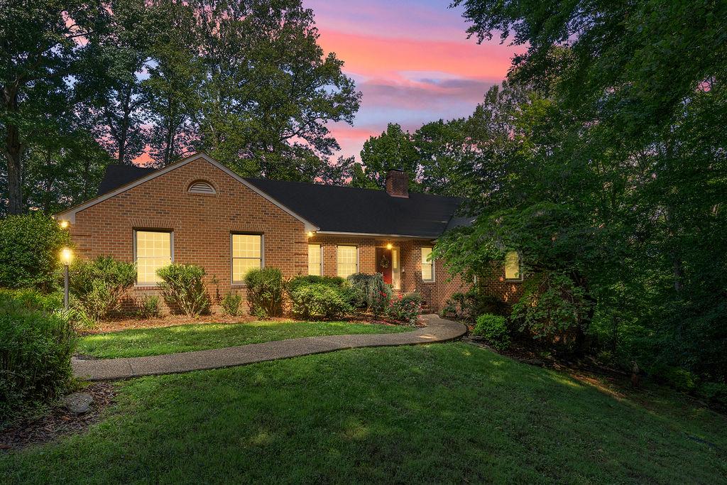 Welcome to "River Point" Perched high on a ridge with panoramic views of the Rappahannock River, this all-brick rambler offers a front-row seat to some of the area’s most breathtaking scenery. Situated on 4.1773 private acres, the property combines a peaceful setting with remarkable convenience just minutes from I-95, Central Park and downtown Fredericksburg.
Built in 1995 and designed with entertaining in mind, the home seamlessly blends indoor and outdoor living with a sprawling wraparound deck accessible from three separate doors and two staircases. The deck features a sunken seating area, motorized awning and sweeping river views that create an unforgettable setting for gatherings, outdoor dining or relaxing evenings overlooking the water. A paved circular driveway provides plenty of parking and easy flow for guests.
Inside, the family room centers around a striking stone wood-burning fireplace and includes a wet bar that opens to the eat-in kitchen, sun room and outdoor living spaces. The sun room also offers direct access to the deck, allowing the views to take center stage throughout the home. The kitchen is equipped with granite countertops, stainless steel appliances and a center island ideal for entertaining and everyday living. Pocket doors lead to an oversized formal dining room that can easily accommodate larger gatherings.
The thoughtfully designed main level offers privacy and functionality with the primary suite positioned separately from the additional bedrooms. The spacious primary bedroom features private deck access, a walk-in closet and a large bath with jetted tub, separate shower, built-in shelving and double vanity. Two additional bedrooms are located on the opposite side of the home and share a Jack-and-Jill bath with double vanity. A half bath, laundry room and separate mud room leading to the side-loading two-car garage add convenience to daily living. The garage also includes walk-up attic access for additional storage.
The finished lower level expands the living space with a rec room featuring a corner gas fireplace and full-sized windows for natural light, a third full bathroom, a two-room bonus area with exterior access and a workshop space. Additional storage is available in the walk-in crawl space with double door access.
The newly replaced heat pump offers gas back-up for added comfort and efficiency. 
Providing exceptional entertaining spaces, versatile living areas, privacy and spectacular river views, "River Point" presents a rare opportunity to enjoy both tranquility and convenience in one remarkable setting.