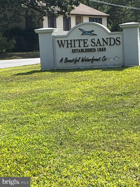 Great opportunity to build your custom home in the established White Sands community. This lot is conveniently located just off Route 4, offering easy access while maintaining a residential setting. Ideal for buyers with vision looking to create their own space.