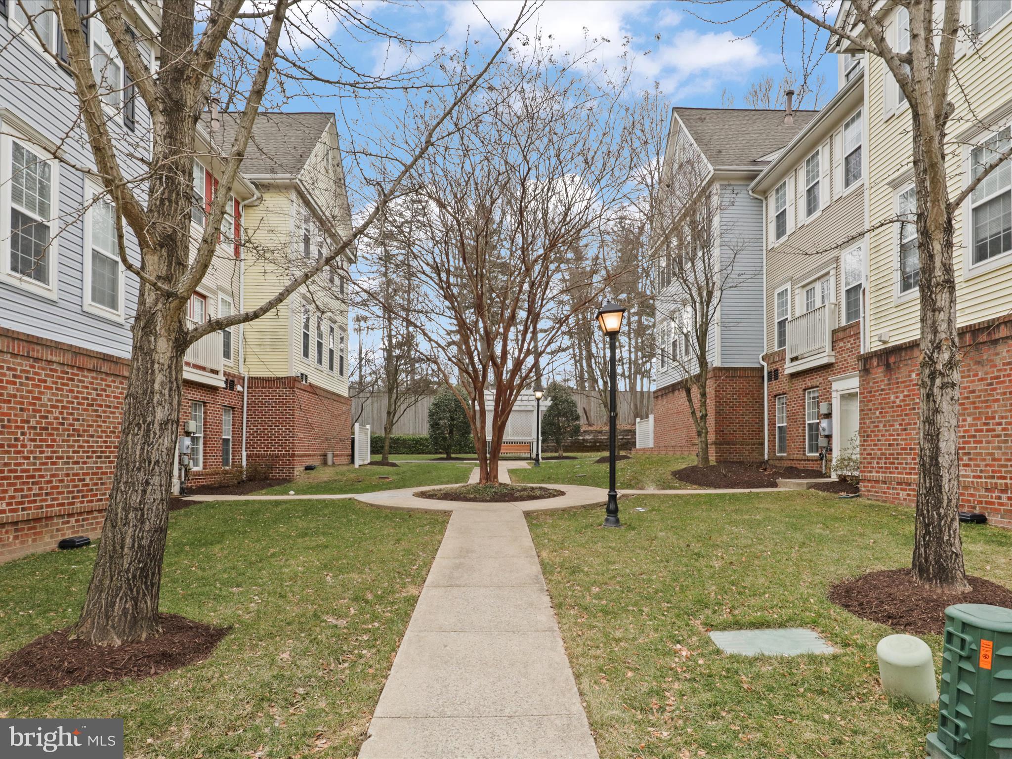 Motivated sellers—schedule your showing today for this beautifully updated townhome just steps from the vibrant and highly sought-after Mosaic District and its popular weekly Farmers Market! Inside, enjoy hardwood floors, plush bedroom carpeting, and a bright, open layout with a cozy gas fireplace. The gourmet kitchen features granite countertops, stainless steel appliances, and ample cabinet space—perfect for entertaining. All three full bathrooms are upgraded with high-end vanities, marble countertops, and modern lighting. The spacious entry-level bedroom with a walk-in closet can double as a home gym or guest suite. Upstairs, the primary suite includes another walk-in closet and a spa-like bath. Recent updates include a new oven and hood (2020), upgraded appliances, HVAC, smart thermostat, and refreshed lighting and vanities throughout. Walk to shops, dining, entertainment, and the Mosaic District Farmers Market. Close to Dunn Loring Metro, I-66, I-495, and Route 50. Community amenities include a pool, gym, dog park, trails, clubhouse, and more. Don’t miss your chance to own in one of Fairfax’s most desirable communities!