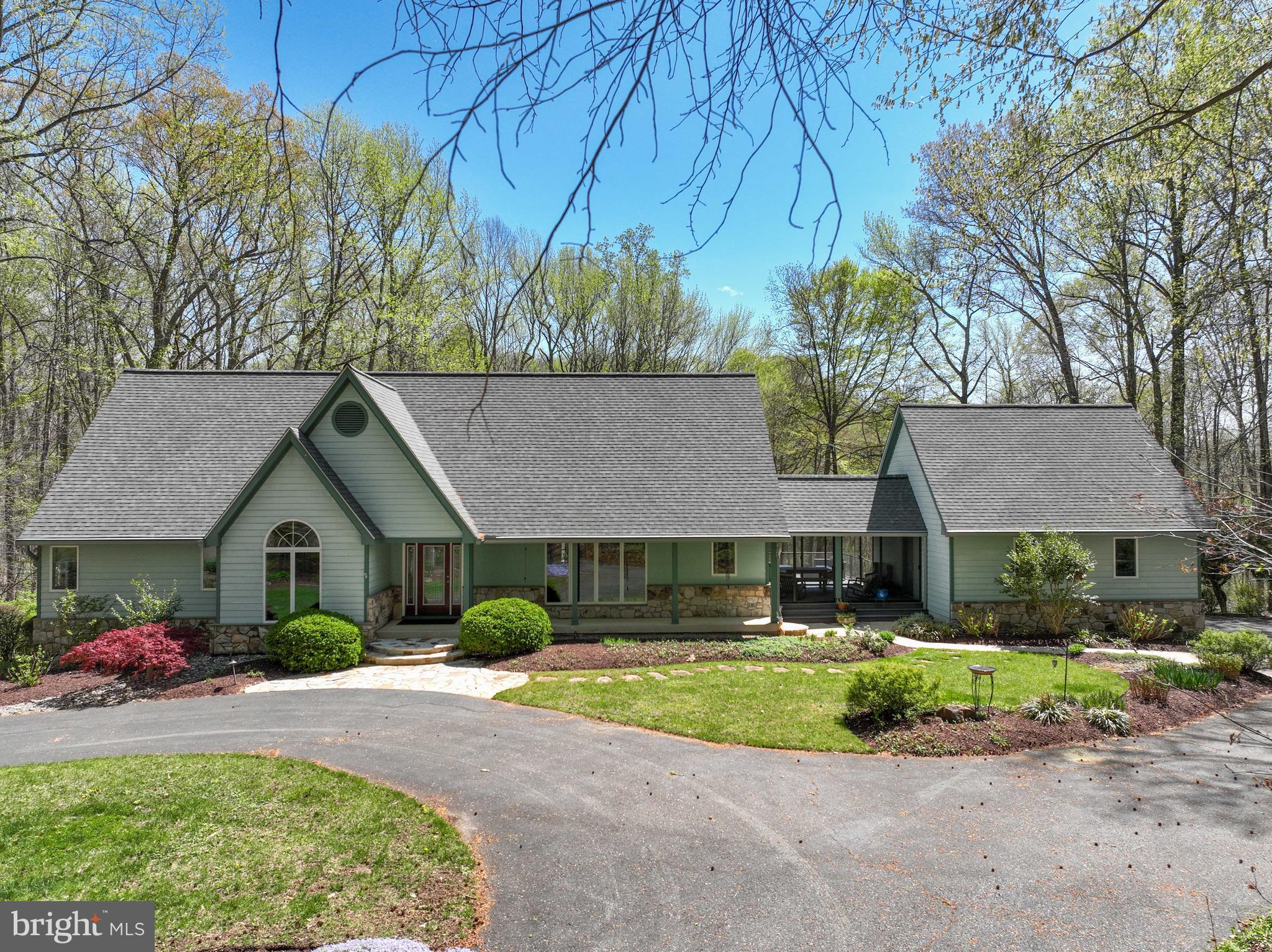 This is the property you have been waiting for!  Located on a court, on a flag lot, providing a regal approach to this spacious property which backs to private woods & farms, adding to this peaceful location.  This custom built home boasts of quality construction & takes advantage of the scenic vistas.  Enter via a 2-story foyer.  Enjoy the open floor plan w/ plenty of places to relax & entertain.  The primary suite is on the main floor.  Enjoy the outside decks, hardscape & large screened porch.  Private places & open spaces! Updates include new roof & gutters (2020), irrigation system (2019), leaded glass style front door & sidelight windows (2016), new vanity top in half bath (2025).  Too many upgrades to mention.  This is a must see!!!  
PLEASE DO NOT ENTER DRIVEWAY WITHOUT AN APPOINTMENT