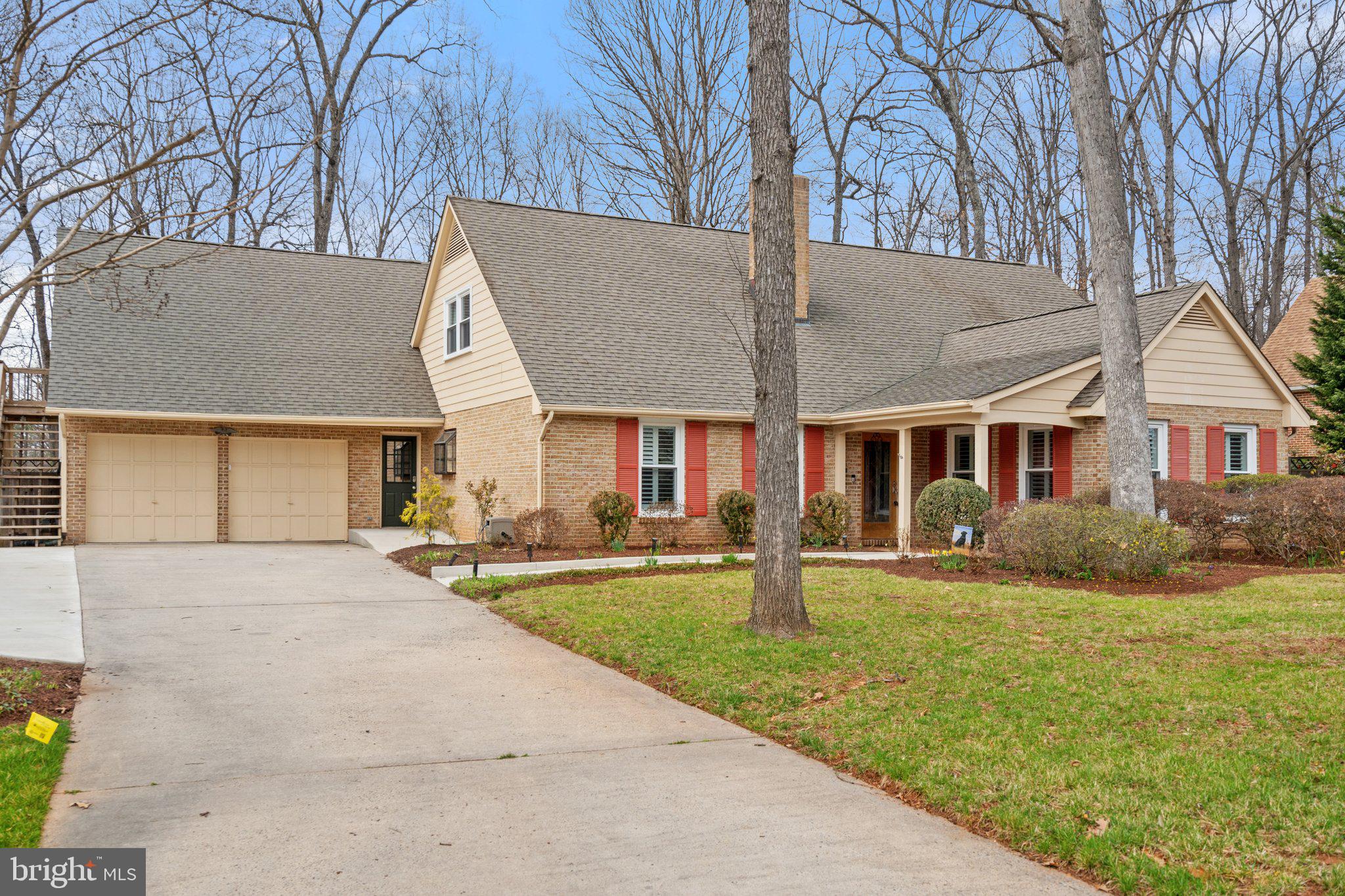 One of the best homes tucked away on a quiet street in the highly sought community of Owens Wood. This wonderful home has 3225 finished sqft, 5 bedrooms, 3.5 baths with a main floor primary bedroom suite. (Handicap Accessible possibilities) This house has many unique features including the Travertine marble flooring, arched entrances, open floor plan and wood-burning fireplace with a unique custom mantle. Kitchen has double sinks, garden window, granite countertops, SS appliances, double oven, pantry and an adjoining open Dining/Breakfast Room. There is also an elegant formal Dining Room just off the kitchen and foyer. Plus main level Office/Bedroom. Multiple large rooms have Bedroom/in-home Office potential. Walk out the (6 total) sliding glass doors to the expansive hardscape with oversized field stone patio, and an additional awning covered patio. The home is surrounded by well established trees, shrubs and beautifully manicured gardens in a natural setting backing to trees. A private entrance is accessible from the garage side of the home that leads you to the en-suite 5th bedroom. NO HOA! Located minutes outside historical Olde Town Manassas: VRE Commuter Train, great restaurants, shopping and fun activities - - HIGH QUALITY RECENT UPDATES: Replacement Windows (2024), Primary Bath (2022), Half Bath (2022), Plantation Shutters,  Gas Furnace (2022), Heat Pump 1 (2021), Air Handler 1 (2022), Air Conditioner #2 (2022), Hot Water Heater (2022), Speed Queen Commercial Washer & Dryer (2022) - - NO EXPENSE WAS SPARED - A Pre-Llisting 6-Point Home Inspection (108 pages) has been performed. This home is in excellent TURNKEY move-in condition. HOME IS FILLED WITH TOP-DOLLAR FINISHES!!!