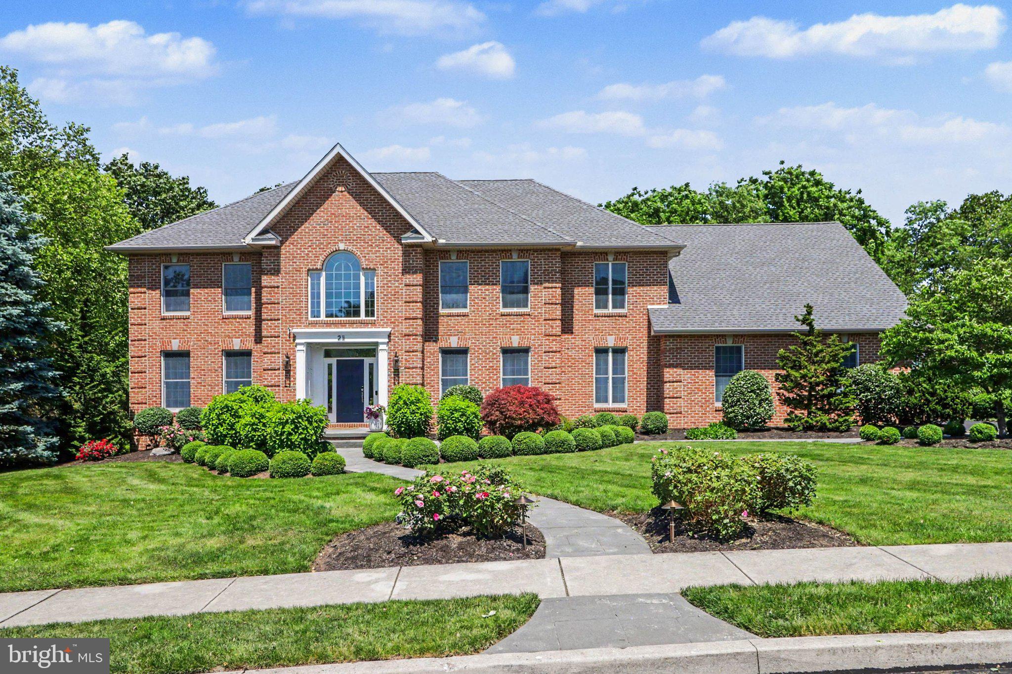Discover this exquisite home in Lindenwood development with custom appointment ship and superb detail that is evident through-out this Mumper Builder Estate Home. This home encompasses nearly 5,000 sq ft of living space. 1st floor living is at its finest with a modern open floor plan which is terrific for entertaining and welcoming your guests to this fabulous home. This 6 bedroom, 5.5 baths with oversized 4 car garage is specifically designed for those who crave leisure, maintenance-free living. You'll feel welcome when you step onto the front stoop, open the front door and for the first time walk into the 2 story foyer to discover the Creativity, Exceptional Quality and Craftsmanship. On the left is the formal living room and on the right is the formal dining room. From the foyer is the Family Room with brick gas fireplace and plenty of windows for natural light.  The custom kitchen which was remodeled in 2010 has beautiful custom Cherry cabinets, subway tile back splash, granite counter tops, 8 foot island with granite, prep sink, beverage fridge, and ice-maker machine.  The stainless steel appliances are all high end, Wolf gas cooktop, double oven, microwave, Miele dishwasher and Electrolux refrigerator.  The breakfast area which is an extension of the kitchen leads to the deck. Other rooms on the main level are the laundry room, half bath, office/5th bedroom and full bath. One needs to see the Owner's Suite with gas fireplace and 2 walk-in-closets. The Owner's bath has a jetted soaking tub, ceramic walk in shower and 2 single sink vanities. There are 3 more bedrooms upstairs with one having its own full bath and walk-in-closet. The other 2 bedrooms share a Jack-in-Jill bathroom with double bowl sinks.  The lower level is approximately 1300 square feet of livable space having a family room with gas fireplace, 6th bedroom, full bath, kitchenette and exercise room which also could be a bedroom if need be.  The utility/storage room is expansive with utilities tucked away for plenty of room to store everything.  Don't forget to see the inviting deck, 3 patios and backyard where you can enjoy those evenings, entertaining, cooking outside, relaxing or sitting around the fire pit/gas fireplace with meandering water fall in the background.  Other Home features include new roof in 2025, dual 3 zoned forced air gas heat, central air and humidifiers, radon mitigation system and recessed lighting,  This home is a definite must see to appreciate.