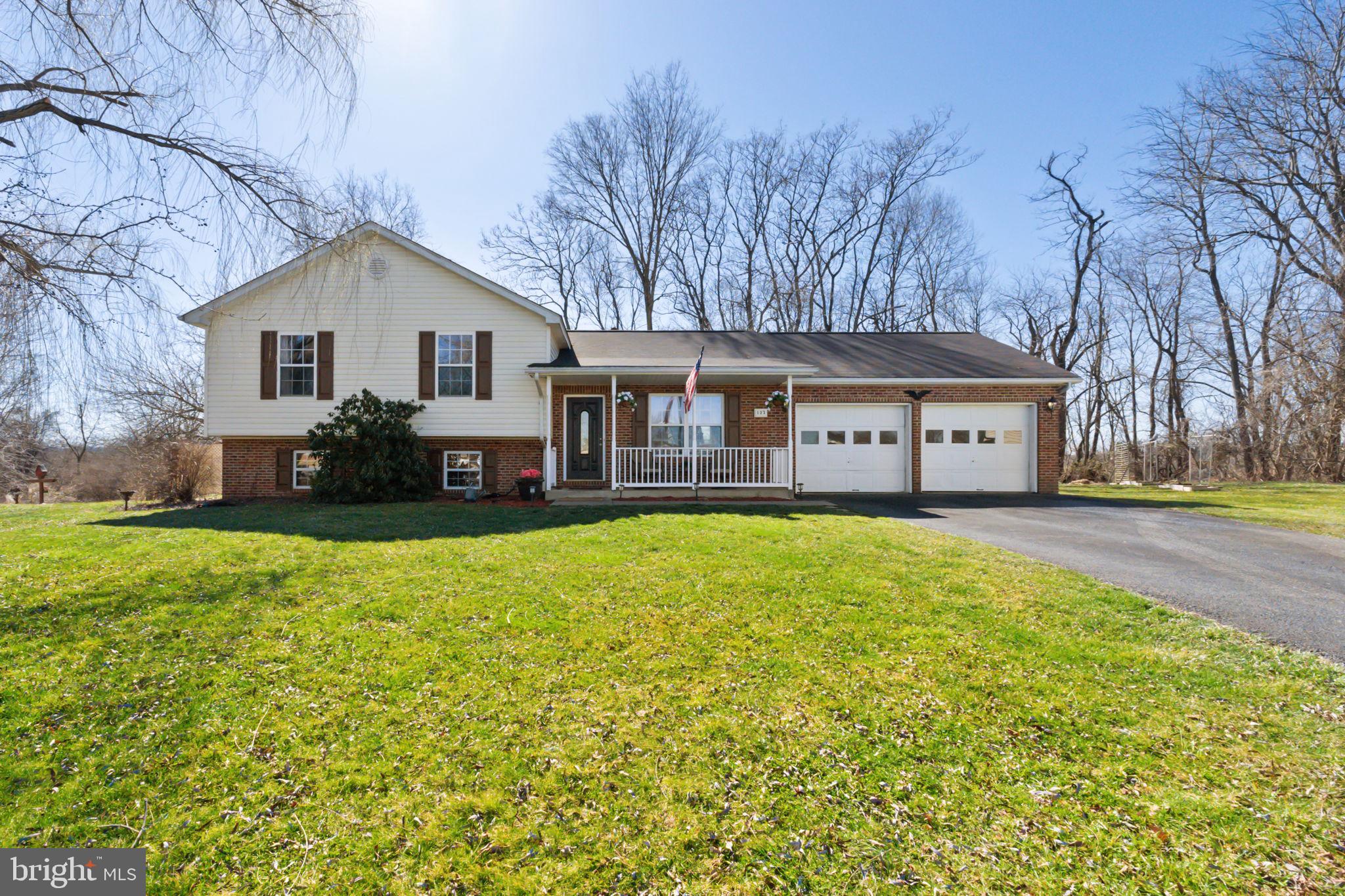 Welcome to this well taken care of bi-level home in Briar Run Estates! This home boasts a perfect blend of updates and timeless charm. As you approach the front porch, you are greeted by its classic appeal, a haven where mornings begin with a cup of coffee and evenings end with the glow of a setting sun. With fresh paint and new carpet in the bedrooms, this home provides a welcoming atmosphere. In addition to the exterior, a brand-new roof was installed in 2022, ensuring both durability and curb appeal. The partial brick front also adds a touch of sophistication. Inside, you'll find a total of 4 bedrooms and 2.5 baths, providing ample space for your comfort. The eat-in kitchen offers stainless appliances, an island, and elegant granite countertops.  The basement is a hidden treasure, featuring one of the bedrooms, and a rec room with a cozy pellet stove, perfect for chilly evenings. The wet bar in the basement adds an extra element of entertainment, making it an ideal space for hosting gatherings.  The attached 2-car garage offers both convenience and security for your vehicles. Step outside onto the recently stained cedar rear deck and enjoy a peaceful space perfect for entertaining or unwinding after a long day. You can also enjoy fresh, homegrown produce just steps away from your kitchen with the vegetable garden right in your backyard!  This home is not just a property; it's a testament to care and pride of ownership, as it has been maintained by its single owner. Situated on a quiet cul-de-sac, the location provides a serene environment for you to call home.