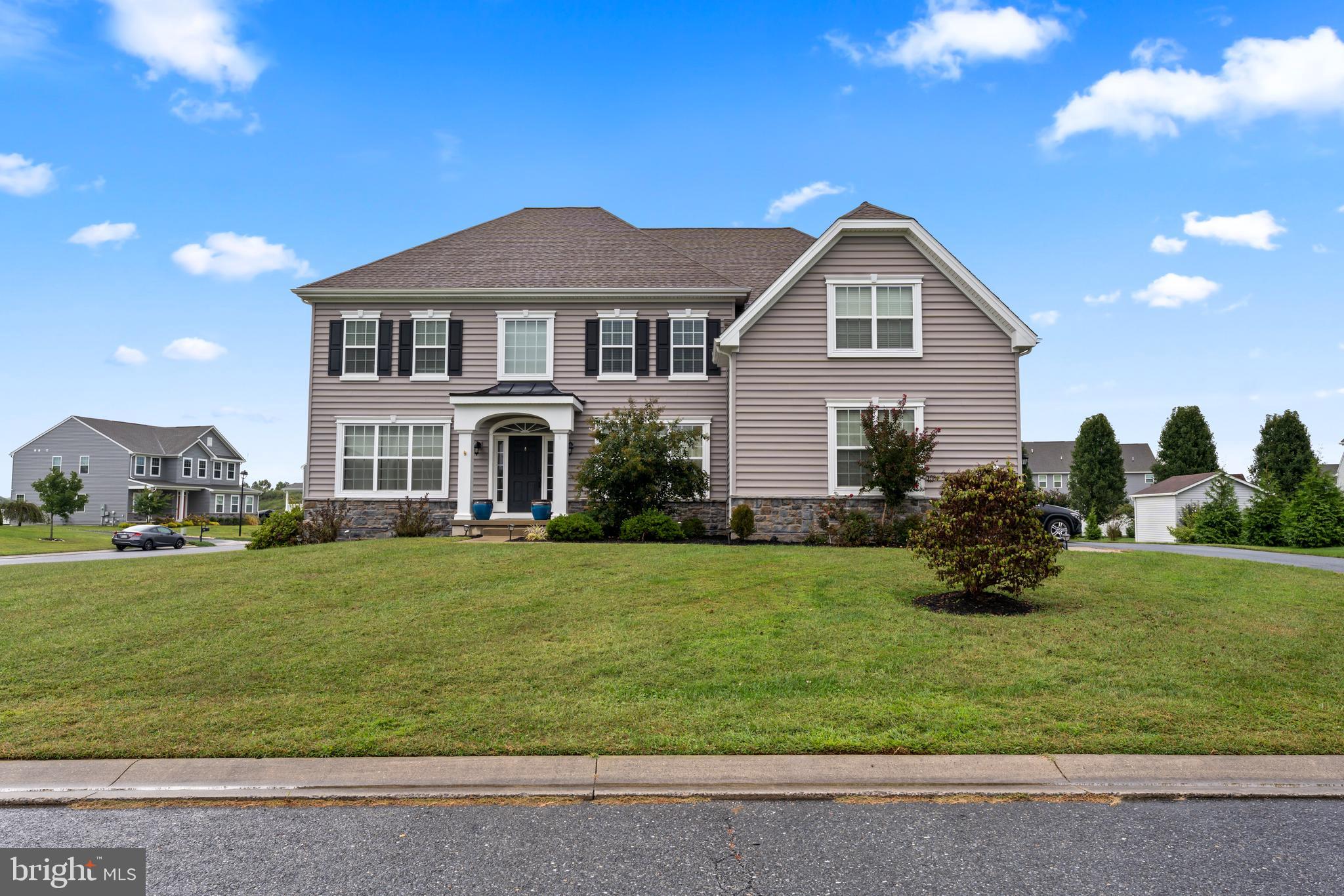 Step into this stunning two-story home in the highly desirable Camden Wyoming area. Built in 2016, this beautifully maintained single-family residence offers over 4,000 square feet of living space, perfect for families seeking comfort, style, and functionality. The main level welcomes you with a grand foyer and soaring ceilings, flowing seamlessly into formal living and dining spaces. A gourmet kitchen with a large island, breakfast bar, wall oven, and cooktop opens to a cozy family room with a fireplace, creating the ideal setting for entertaining or everyday living. An additional versatile room on the main floor can serve as a home office, playroom, or den.
Upstairs, the owner’s suite provides a private retreat, featuring a luxurious en-suite bathroom with dual vanities, a walk-in tile shower, and a spacious walk-in closet. Three additional bedrooms share a beautifully appointed bathroom, while a conveniently located laundry room makes everyday living easy. A high-ceiling basement offers endless possibilities for recreation, a home theater, or additional living space.

Situated on a 0.64-acre lot, the home also features a two-car garage, professionally landscaped grounds, and room for outdoor entertaining or relaxation. Families will appreciate the proximity to top-rated schools within the Caesar Rodney School District, including Stokes Elementary, Fifer Middle, and Caesar Rodney High.
Location couldn’t be better: just a short drive to major roads, this home offers quick access to Route 1 and Route 13, making trips to Wilmington, Dover, or even the Maryland border simple. Rehoboth Beach is approximately 35 miles away, perfect for weekend getaways, while nearby parks such as Killens Pond State Park and Brecknock County Park provide outdoor recreation options. Delaware State University and other cultural amenities are also within easy reach.
This home combines elegance, space, and convenience, offering a rare opportunity to enjoy modern living in a prime location close to schools, shopping, beaches, and major commuting routes.