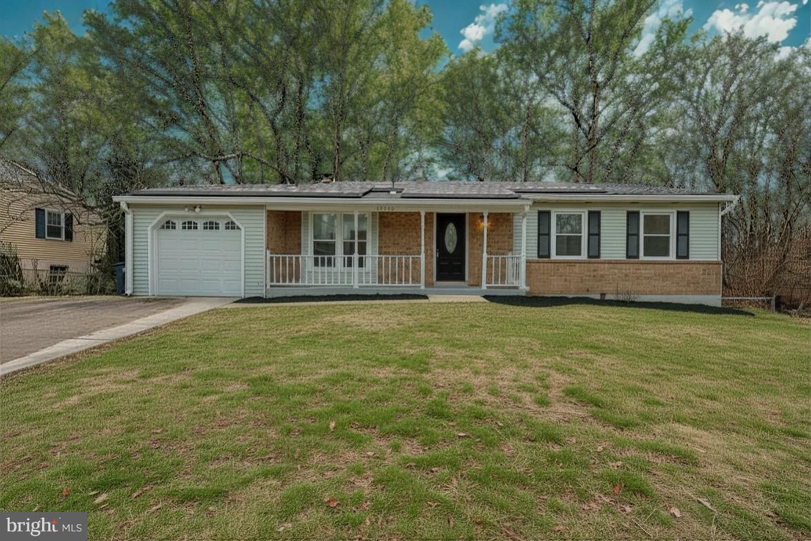 This practical, brick-front one-level home offers easy, long-term living with a finished, walkout basement and one-car garage.  The open main level features gleaming refinished hardwoods and a stunning updated kitchen with granite, stainless appliances, new cabinets, and porcelain tile.

The owner’s suite includes a private remodeled bath with a standing shower, plus two additional bedrooms and a remodeled hall bath. The expansive lower level adds a large entertainment space with a fireplace, two bedrooms, and a third full remodeled bath. Enjoy a spacious backyard in the secluded Tantallion South neighborhood, perfectly situated near the beltway for a quick commute to DC, National Harbor, and VA.