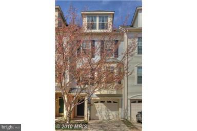 Wonderful home with easy access to community pools; near Soldiers Delight park. Beautiful 3BR 2.5 B townhome with gleaming mahogany hard wood floors and tiled entryway.   Master suite on entire upper level with luxury bathroom.... Newer appliances & +.  Large deck off the kitchen with walkout lower level, new paver patio and fully fenced rear yard.   FRESHLY PAINTED!!!   MOTIVATED SELLER...