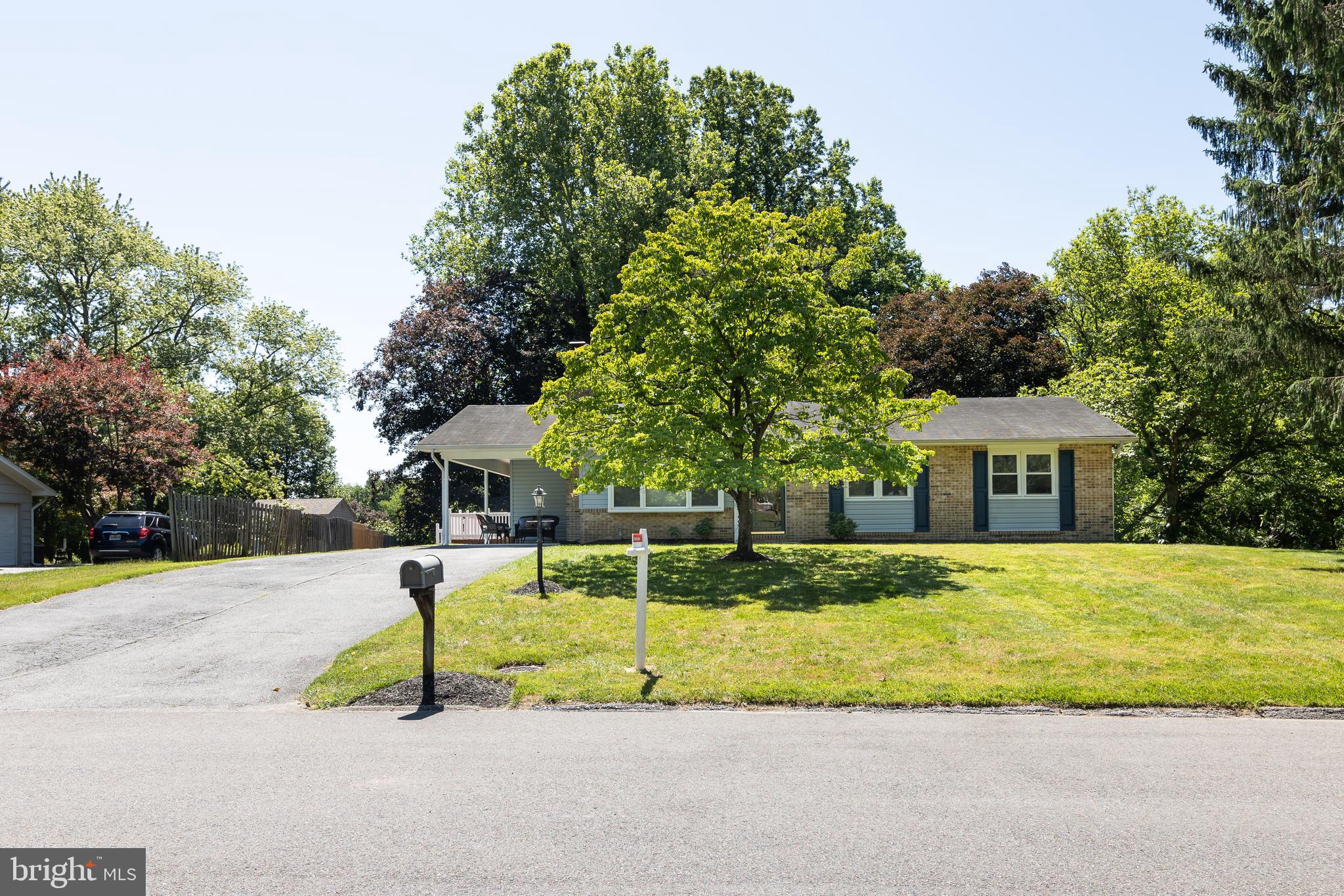 Welcome to this beautifully remodeled rancher in one of Ellicott City's most sought-after locations! Situated on a premium half-acre lot, this two-level home offers comfortable main-level living with extensive updates throughout.

The updated kitchen features granite countertops, stainless steel appliances, abundant cabinetry, and a pantry, making it both functional and stylish. The main level offers three spacious bedrooms and two fully renovated bathrooms, providing convenience and comfort for everyday living.

The finished walkout lower level adds exceptional flexibility with a large office or recreation room and a half bathroom, ideal for working from home, entertaining, or creating additional living space.

Step outside to enjoy the freshly repainted deck and patio, perfect for relaxing or hosting gatherings. The expansive backyard offers endless opportunities for entertaining, gardening, recreation, or simply enjoying the outdoors.

Conveniently located near schools, parks, shopping, dining, and major commuter routes, this move-in-ready home combines modern updates, generous living space, and a fantastic location.

Don't miss this exceptional opportunity to own a beautifully updated home in Ellicott City!