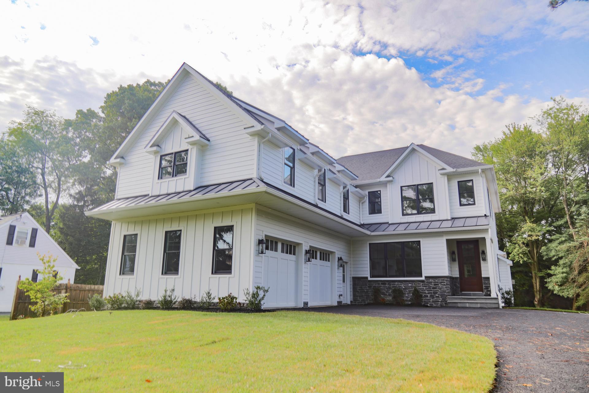 An incredible opportunity to own an exceptionally built custom home located in the award-winning Tredyffrin school district.  The close proximity to all things Main Line, beautiful setting of Red Fox Lane, over 5,000 square feet of living space, and complete versatility in this 5 bedroom 6 full 1 half bath home makes it a one-of-a-kind!  The open flow of the first floor with front-to-back natural light, vaulted ceiling detail in the great room, 5 en suite bedrooms, great covered outdoor entertainment space and stunning fixtures and finishes throughout make this home a must-see!  ZDomus is the designer and you will be wowed by the selections made on this one of a kind masterpiece.   Pull up and fall in love with how the home is set back off the beautiful tree lined street.   The large driveway offers plenty of parking for your guests and leads you to a 2 car oversized garage with interior access.  The black windows, standing seam roofing details, stunning front entry with a custom door, upgraded lighting package and high end siding is all classic, yet perfectly modern.  The first floor offers an insanely sunlit floor plan to include a beautiful foyer entry, a classic formal dining room space with a gorgeous chandelier and custom millwork, an unbelievably spacious open kitchen and great room concept, a butlers pantry like you've never seen before, a bonus room, overlooking the gorgeous backyard and a mudroom entry with powder room.  The kitchen has an incredible flow to include a huge center island in a white oak, quartz countertops, custom hood above the range, recessed lighting, high end light fixtures, plenty of space for a large table and chairs and a built in window seat offering seating and storage!  The great room has a coffered ceiling design, french doors that lead you out to the blue stone covered back porch (with gas grill line ready for use), overlooking the very large and level backyard.  French doors off the great room also lead you to the bonus room that would make a wonderful office, playroom or sitting room.  The butlers pantry is unreal!  Two toned cabinetry and plenty of them, double oven, overflow fridge space, quartz countertops and the perfect place to prepare for your larger parties and holidays.  The white oak style floors span the entire first floor (with the exception of the mudroom) and create a super cohesive feeling throughout- stunning.   The bedroom level of the home has 5 suite spaces!  Each large bedroom has is en suite- talk about versatilely!   The primary suite is stunning with it's tray ceiling and ship lap finish, abundance of windows, custom tiled bath and plenty of walk-in closet space.  All of the bedrooms are large with plenty of closets and uniquely tiled baths- each one has unique touches.  The walk-out lower level of the home offers an additional 1,000+ square feet with the 6th full bath, for whatever your needs are.  Create the home theatre of your dreams, a huge gym, a wonderful guest quarters, host in laws or house an au pair- you name it as you've been given a clean canvas to do so.   The carpeting in the home is tone on tone and high end.   This home is truly stunning and offers so much space, versatility and function.  The beauty of it's location is that it's in an established and cherished neighborhood perfectly tucked away in TE.   Close proximity to all things Main Line.   Local universities, award winning public schools, private schools, major highways leading to Philly, NY and NJ.  Take advantage of all Wayne has to offer in the evenings like The Blue Elephant, 118 North or Goats Beard and enjoy the joys of downtown Wayne for shopping, grabbing a cup of coffee or a slice of pizza.  Wayne offers everything you'll ever need.  Book your appointment today!