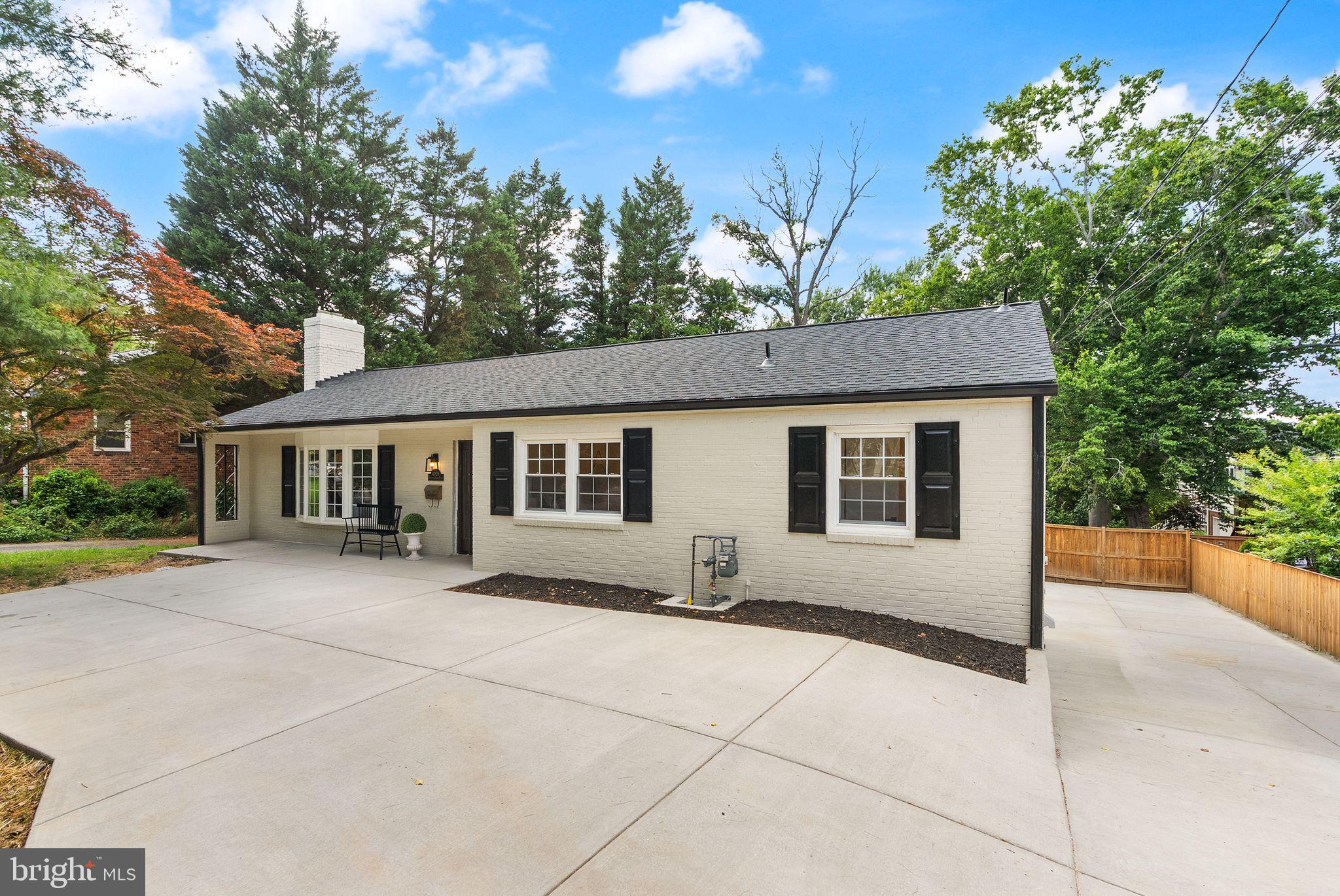 Luxury, Location & Lifestyle in North Arlington! Welcome to this fully reimagined and extensively upgraded rambler in one of North Arlington’s most desirable neighborhoods. Thoughtfully renovated from top to bottom, this move-in-ready home showcases an impressive list of major improvements, including a new roof and gutters (2024), new windows (2024), new HVAC (2026), all-new concrete work (2026), a brand-new deck (2026), designer kitchen, fully remodeled bathrooms, new flooring, fresh paint, updated lighting, and much more.

Step inside to discover a bright, open-concept layout designed for modern living and entertaining. The main level features stylish luxury vinyl flooring, a spacious living area, and a stunning chef’s kitchen complete with custom cabinetry, high-end stainless steel appliances, quartz countertops, designer backsplash, and an oversized island that serves as the heart of the home. The main level also offers two spacious primary suites, including one with a walk-in closet, plus a convenient powder room for guests.

Every bathroom has been meticulously renovated with porcelain tile, custom vanities, and upscale finishes. The fully finished lower level provides exceptional flexibility with a large family room, an additional bedroom, full bath, laundry/storage area, and a spacious bonus room that can easily serve as a fourth bedroom, office, gym, or guest suite.

Outside, enjoy the brand-new deck with finished space underneath, extensive new concrete work, and an oversized driveway with parking for 6–8 vehicles—an incredibly rare find in North Arlington.

The location is equally impressive. Situated just minutes from Washington, D.C. and major commuter routes, this home offers easy access to the vibrant Ballston corridor, Ballston Quarter, Metro stations, parks, trails, dining, shopping, and entertainment. Residents enjoy proximity to highly regarded Arlington schools, neighborhood parks, and some of the area's most sought-after amenities. 

A rare opportunity to own a fully renovated home with luxury finishes, abundant parking, and an unbeatable North Arlington location—all at an exceptional value.