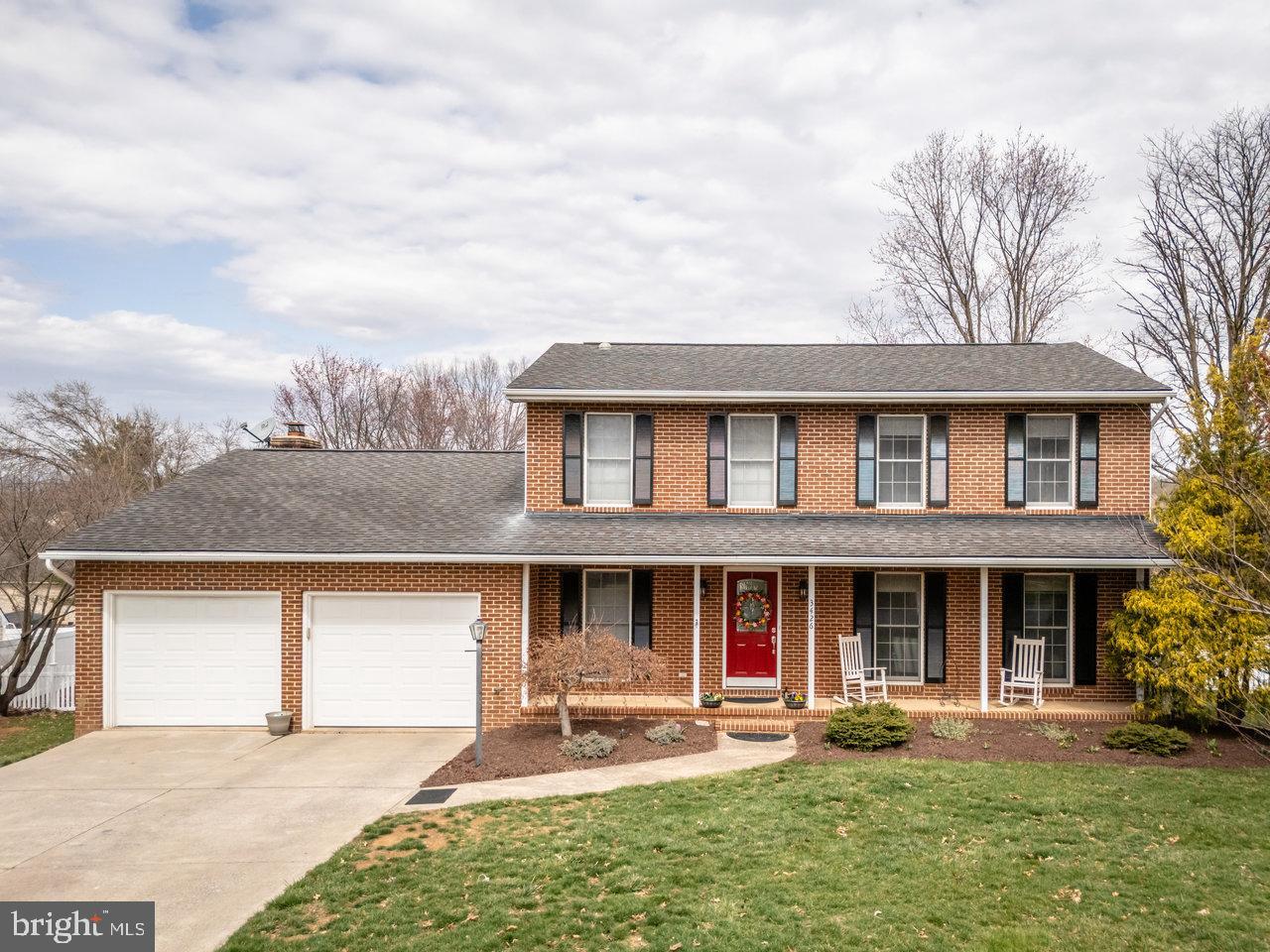Two-story brick home just west of the city in Belmont! Main level features 13x17 living room, 11x11 dining room, 11x22 kitchen with stainless appliances (including 5-burner gas range), quartz counter, and tile backsplash. 13x22 den, mud/laundry room, half bath with marble top.Upstairs you'll find four bedrooms and two full baths, including an owner's suite with 13x19 bedroom, walk-in closet, and brand new tile in the bathroom!Gorgeous hardwood floors throughout main level, and upstairs hallway and primary bedroom. Outdoor spaces abound: covered front porch across the front of the home, 672 sq. ft. rear deck, and one of the best back yards you'll find in a neighborhood (fully fenced). Spacious double garage.