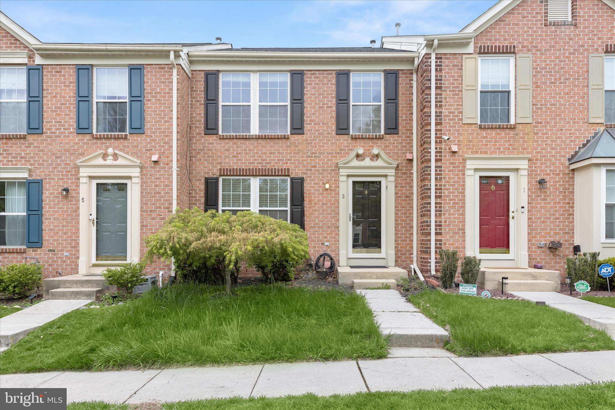 Introducing this sun-filled four bedroom, three and a half bathroom townhome in the desirable New Town neighborhood, offering three finished levels of living space. A full rear bump-out on all levels adds valuable square footage throughout. Step inside to a freshly painted neutral interior complemented by new luxury vinyl plank flooring across the main level. The spacious front living room provides a comfortable setting for relaxing or entertaining. Prepare your favorite meals in the brand new kitchen that features stainless steel appliances, quartz countertops, modern shaker cabinetry, a pantry, and an island with seating, opening to the dining area. Just beyond, the family room is anchored by a cozy gas fireplace and offers sliding glass door access to the back deck. A half bathroom and coat closet complete the main level. Upstairs, the expansive primary suite showcases a vaulted ceiling, sitting area, walk-in closet, and a private bathroom with a walk-in shower, soaking tub, and dual sink vanity. Two additional bedrooms and a shared hall bathroom are down the hall. The fully finished lower level extends the living space with a versatile recreation room, fourth bedroom, and third full bathroom. Utility and laundry rooms provide added storage. Enjoy outdoor living on the back deck, ideal for grilling, dining, or unwinding.  Brand new roof. The community offers a pool and playground just around the corner. Additional recent updates include a new roof. Conveniently located near I-795, I-695, MD-140, and the Metro at Owings Mills Station, providing easy access to Pikesville, Reisterstown, Towson, and surrounding areas. Nearby shopping, dining, and entertainment options include Mill Station, Foundry Row, Metro Centre, and Festival at Woodholme. Some photos have been virtually staged.