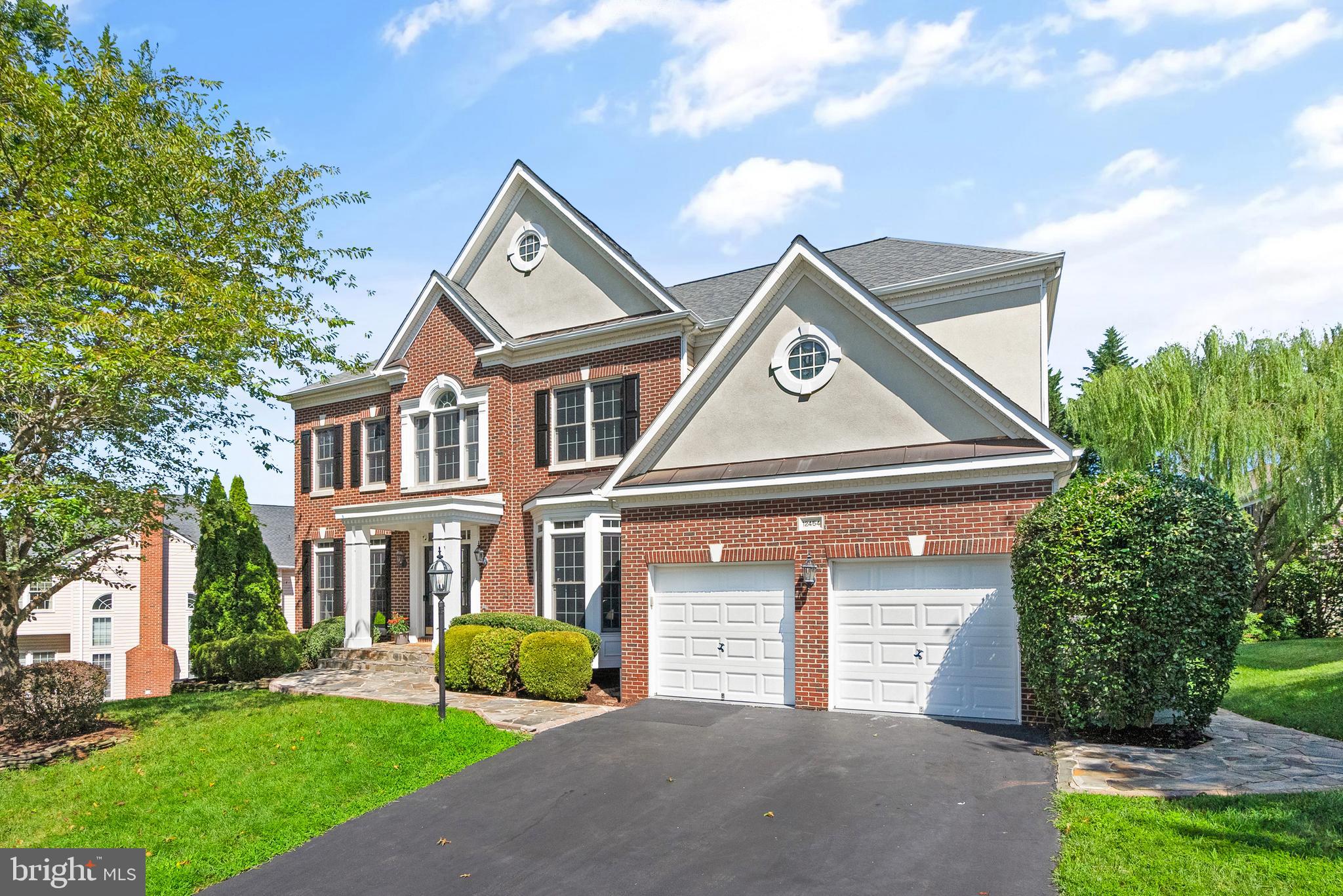 Welcome to this beautifully updated 4 bedrooms, 4.5 baths  home in the highly sought-after Westvale neighborhood, located in the Navy, Franklin, and Oakton school pyramid. This brick front house has over 5800 sq. ft of living space with 3 finished levels with walkout basement to a stone patio, and a large wrap-around composite deck. It includes 3-zone HVAC system and sprinklers system, as well as fine hardwood flooring throughout the entire main and upper levels, with a pre-wired speaker system and recessed lights throughout. The original owners have upgraded this home with more than $350K over the years.  
The main level offers a family room with stone wood-burning fireplace, a renovated kitchen with 2 separate full-sized cooktops, a double wall oven with separate warmer, as well as granite countertop and backsplash. The main level also includes a breakfast area, an island, large pantry, formal dining room, living room, French-door home office/library, powder room, and a bright and spacious sunroom located behind the kitchen that leads to a large wrap-around deck that is perfect for outdoor entertaining. The convenient double-access staircase brings us to the upper level. 
The upper level features a double door leading into the huge owner’s suite with trey ceiling, a generous sitting area and huge walk-in closet. The primary bathroom has a jacuzzi tub, stall shower, and his and her vanities. It also has a laundry room with washer and dryer, 3 additional bedrooms, and 2 full bathrooms. 
The lower-level features fully finished ceramic tiles, a custom media room ideal for movie nights, and walkout basement to a huge stone patio. In addition, the lower level has a large exercise room with mirrored walls, a “5th room”/den, a full-size bathroom, and storage space with a large work bench. The lower level also contains a beautiful wet bar with granite countertops, bar fridge, wine chiller, and a sink.  
This move-in ready home comes with tons of recent upgrades, including: new LVP flooring in the sunroom, updated fixtures and freshly painted. EV charger (2023), Upper floor HVAC (2023), Hot Water Heater (2022), Kitchen (2021), Main/Upper hardwood Floors (2021), Main/Lower floors HVAC (2020), and Roof (2016).
Perfectly located with easy access to Rt.66, Rt 50, Fairfax County Parkway, Fair Oaks Mall, Shopping, Restaurants. Fair Oaks Hospital, Penderbrook Golf Course, Vienna Metro, Reston Town Center Metro, and Dulles International Airport. Minutes walking distance to Navy Elementary school. 
Open house Cancelled : Sunday 8/18 between 1-3 PM.