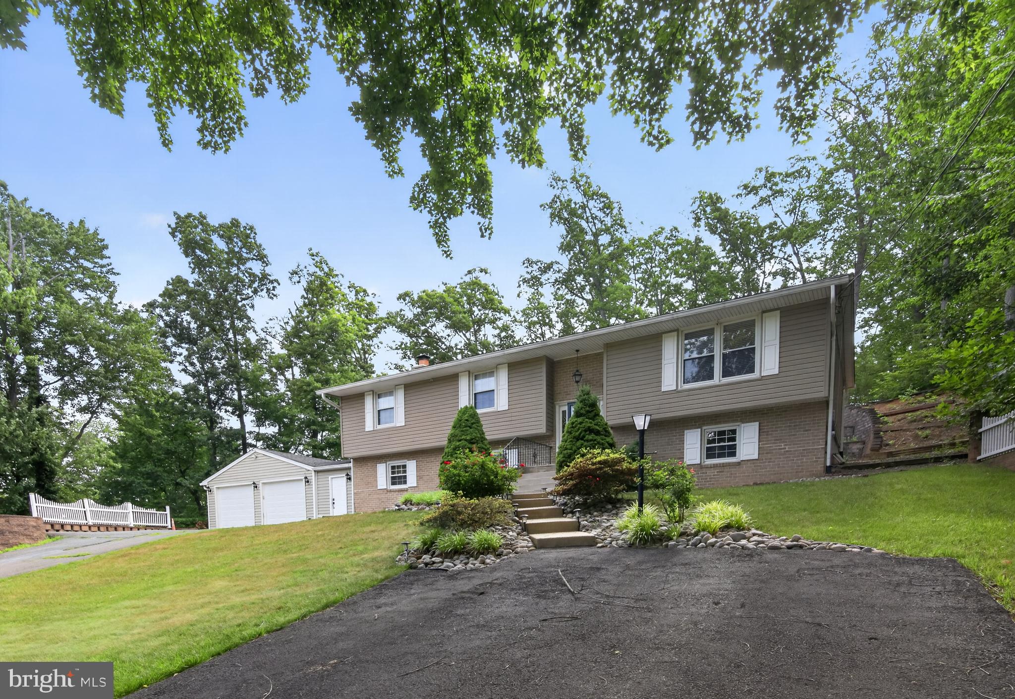 This beautifully maintained single-family home is ready for its new owners. It boasts two levels, five bedrooms, and three full bathrooms. The main level features hardwood flooring, stunning crown molding, a new air conditioning and heating system, a double driveway, and plenty of parking. The curb appeal is truly breathtaking. Located just minutes from major commuter routes, the property offers exceptional accessibility for Northern Virginia and Washington, D.C. commuters alike. Nearby access to I-95, Route 1, commuter lots, and VRE stations including Quantico, Rippon, and Woodbridge make daily travel remarkably convenient. Residents also benefit from nearby commuter parking options such as Dumfries Park and Ride and Share ride pick-up at Route 234 Commuter Lot.