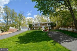 This beautifully maintained single-family home is ready for its new owners. It boasts two levels, five bedrooms, and three full bathrooms. The main level features hardwood flooring, stunning crown molding, a new air conditioning and heating system, a double driveway, and plenty of parking. The curb appeal is truly breathtaking. Located just minutes from major commuter routes, the property offers exceptional accessibility for Northern Virginia and Washington, D.C. commuters alike. Nearby access to I-95, Route 1, commuter lots, and VRE stations including Quantico, Rippon, and Woodbridge make daily travel remarkably convenient. Residents also benefit from nearby commuter parking options such as Dumfries Park and Ride and Share ride pick-up at Route 234 Commuter Lot.