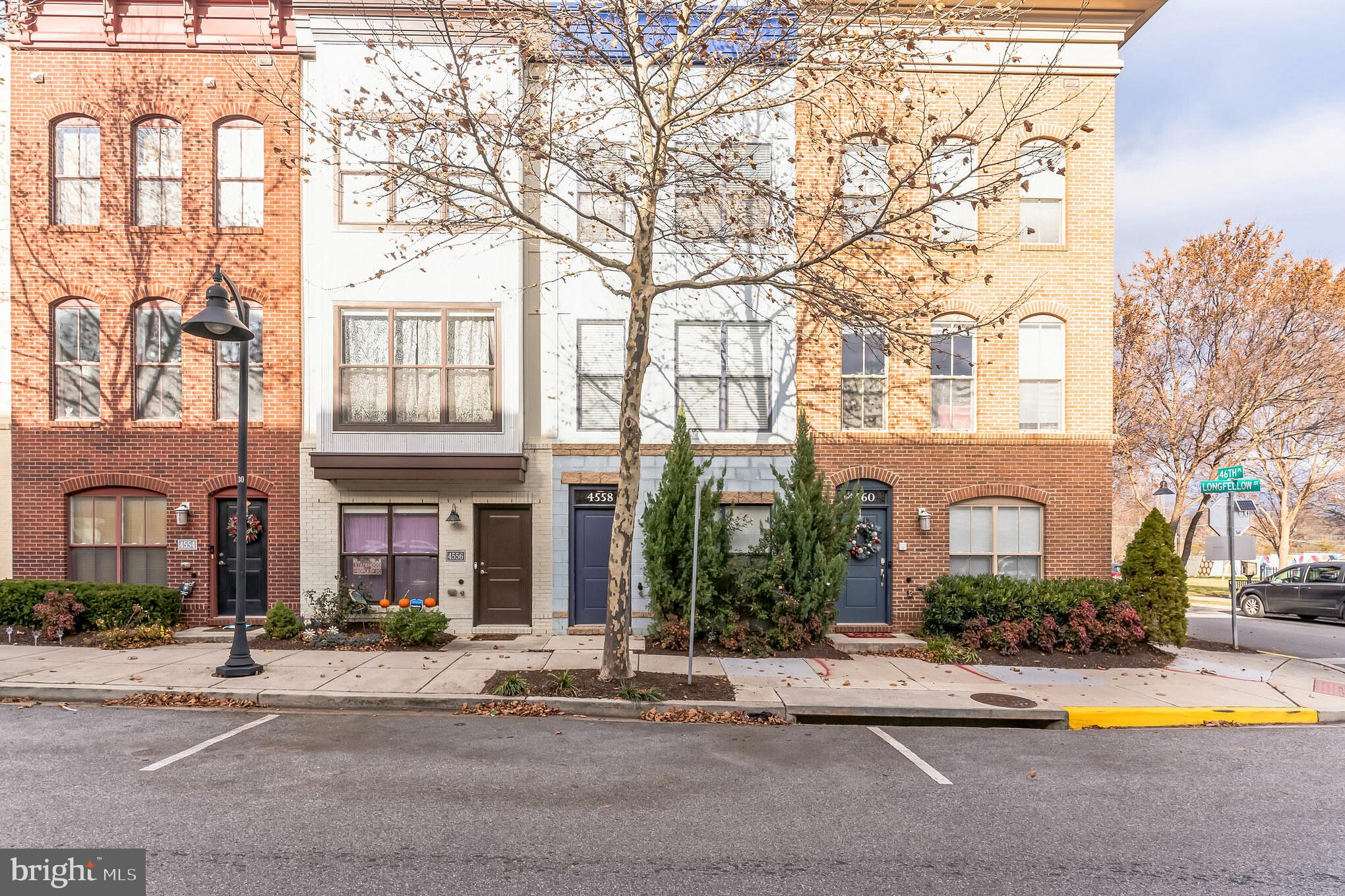 **Property qualifies for $10,000 grant program towards down payment and closings costs. Reach out to Donovan (Listing Agent), so I can connect you to the lender.**

Welcome to this stunning home nestled in the vibrant Hyattsville Historic Arts District! This modern 3-bedroom, 2.5-bathroom residence is a true gem, offering an array of luxurious features.

Step inside to discover a thoughtfully designed interior adorned with recessed lights that illuminate the space with a warm glow. The home is equipped with smart locks, providing convenience and peace of mind. Additionally, the property boasts an EV charging upgrade, catering to eco-conscious individuals and electric vehicle owners. Brand new HVAC system installed in 2023!

Outside, a private roof deck awaits, providing a serene retreat for relaxation and entertainment. The tandem garage parking ensures ample space for your vehicles, adding an extra layer of convenience to your lifestyle.

Situated in the vibrant Hyattsville Historic Arts District, this home offers an unparalleled location with easy access to an array of cultural and entertainment venues. Embrace the dynamic energy of the neighborhood, with a myriad of dining, shopping, and recreational options just moments away.

Don't miss the opportunity to make this exquisite residence your own and experience the best of urban living in the heart of Hyattsville. Schedule a showing today and envision the lifestyle that awaits in this remarkable home!

4558 Longfellow Street is the epitome of urban convenience and upscale living. Nestled in a vibrant neighborhood, it is moments away from premium shopping and dining experiences, including Whole Foods, YES! Organic Market, and the culinary delights of Federalist Pig, Busboys & Poets, Chez Dior, and Spice 6 Modern Indian. The locality also boasts renowned establishments such as Pizzeria Paradiso, Chipotle, Elevation Burger, Riviera Tapas Bar, Franklins, Vigilante Coffee, Tara Thai, Streetcar 82, alongside an array of distinguished local breweries and charming neighborhood boutiques.

For those who relish the outdoors, the property offers seamless access to the scenic Trolly Trail, perfect for invigorating jogs or leisurely bike rides, and is surrounded by a plethora of lush parks and trails.

The homeowners' association enhances this luxurious lifestyle, providing exclusive access to the state-of-the-art Lustine Center. This facility features a modern gym, an inviting swimming pool, a well-equipped business center, a sophisticated lounge, and a pool table for leisure. Additionally, families will appreciate the thoughtfully designed tot lots. 

Situated just a half-mile from the Riverdale MARC station and a mere 6 miles from the heart of downtown Washington D.C., this home is a rare offering that blends serene residential living with the dynamic pulse of city life.

$500 Buyer credit for settlement with KVS Title.