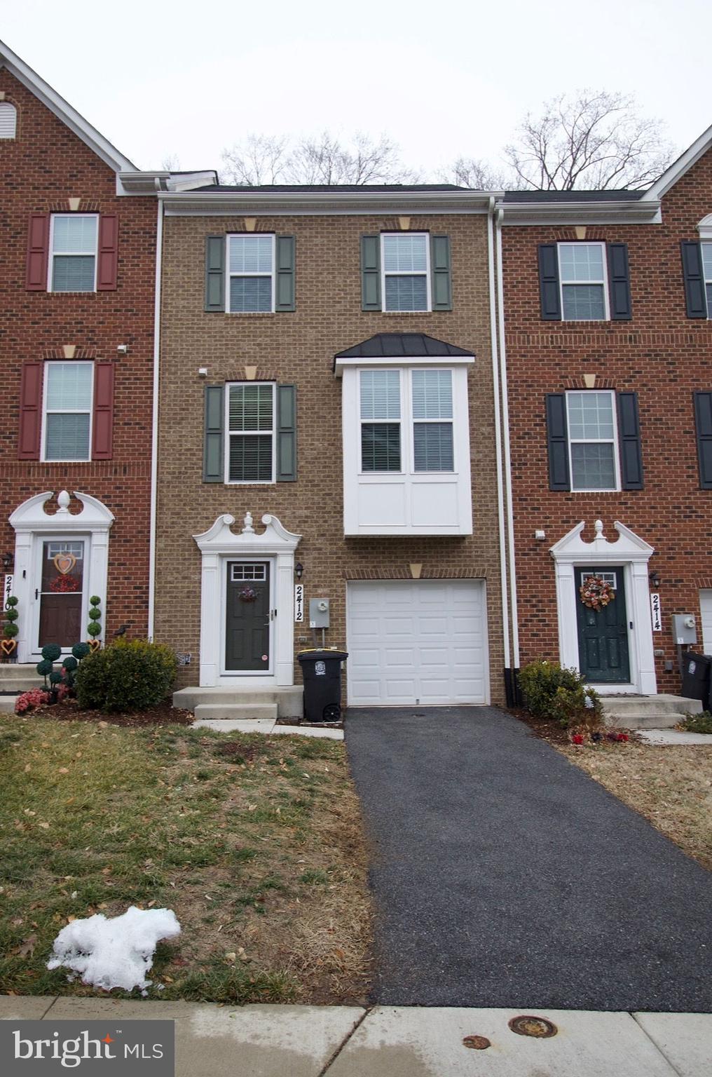 MOTIVATED SELLER WITH MAJOR PRICE DROP!!!Step inside the townhouse that is going to check off every box. This 3bedroom townhouse is located minutes away  from the Washington, DC line and steps away from W. Hyattsville Metro Station. Each bedroom comes with it's own full bathroom making it great for those busy mornings. The home owners took great care of their home so much so it will have you thinking that it is staged but its not. Hardwood floors throughout the entire house. If cooking is your thing then you will love the stainless steel appliances as well as the built in buffet and an island that can seat 4 people with room to hold a dining room table.  The living room has an added half bath for convenience. The family room down stairs comes with a full bathroom as well.  It also has 2 decks with one being a rooftop deck so you can enjoy those summer nights with family and friends.  The added laundry room on the 3rd floor makes laundry day a breeze. Dont worry about cleaning your gutters again because they are equipped with gutter guards. This home wont last long so come tour it today.