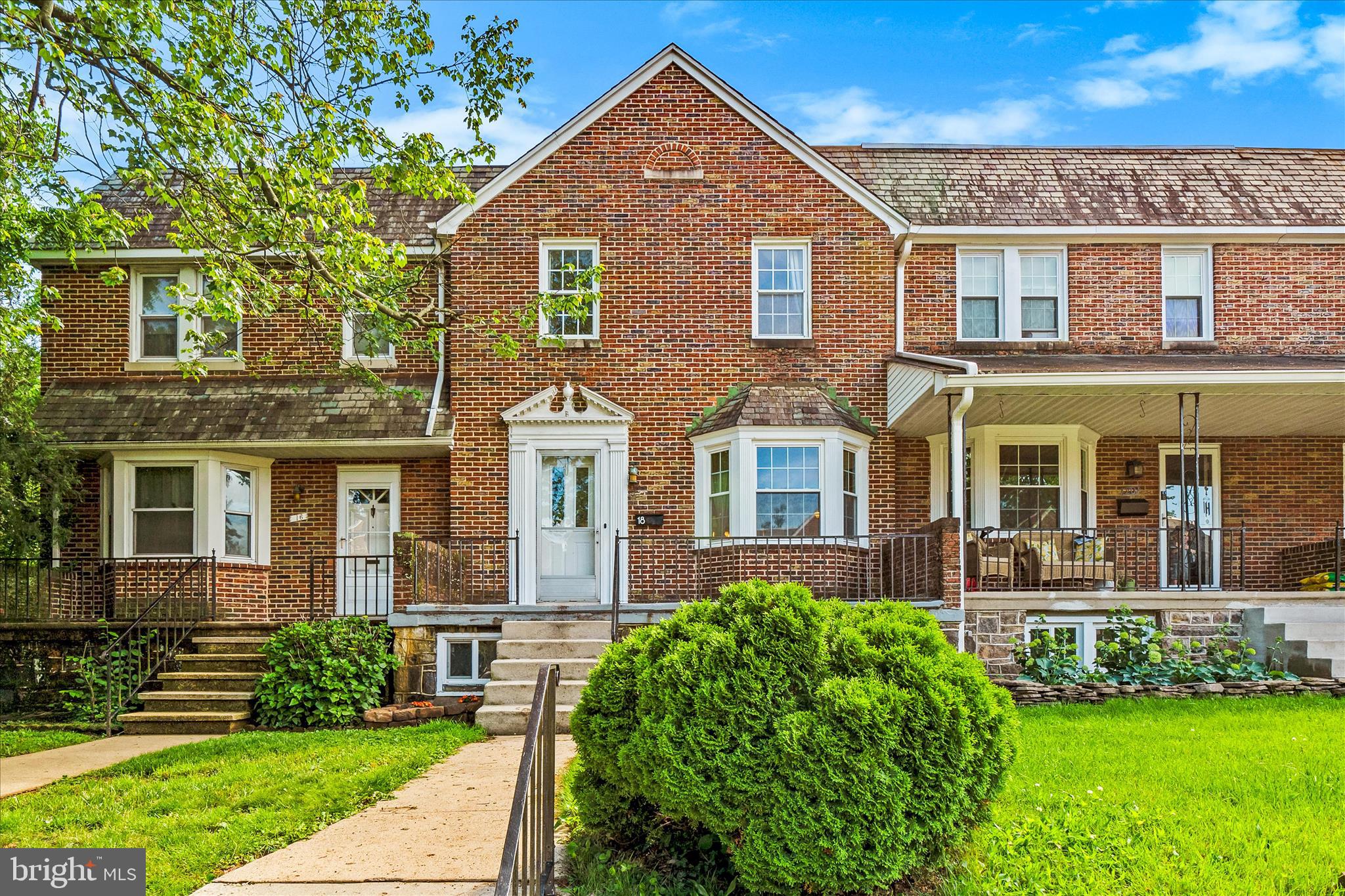 Welcome to this impeccably maintained all-brick townhome on a peaceful, no-thru-traffic street in the heart of coveted Catonsville! The main level showcases rich hardwood flooring throughout, flowing from the inviting living room - featuring a beautiful bay window - into a thoughtfully opened kitchen and formal dining area, perfect for entertaining. Upstairs you'll find three comfortable bedrooms, a full bath with a brand-new sink, and newly extended hardwood flooring. The finished lower level offers versatile living space complete with a full bathroom, freshly painted and ready for your vision. Step outside to enjoy the recently redesigned front landscaping, a charming new garden bed out back, a balcony/deck off the kitchen ideal for summer grilling, and a 1-car garage with rear parking for up to 3 cars. All of this in one of Maryland's most beloved communities, just 15 minutes to Downtown Baltimore, BWI Airport, and UMBC, with coffee shops, breweries, bakeries, and locally owned restaurants just down Frederick Road - truly a place where neighbors put down roots and stay for years!