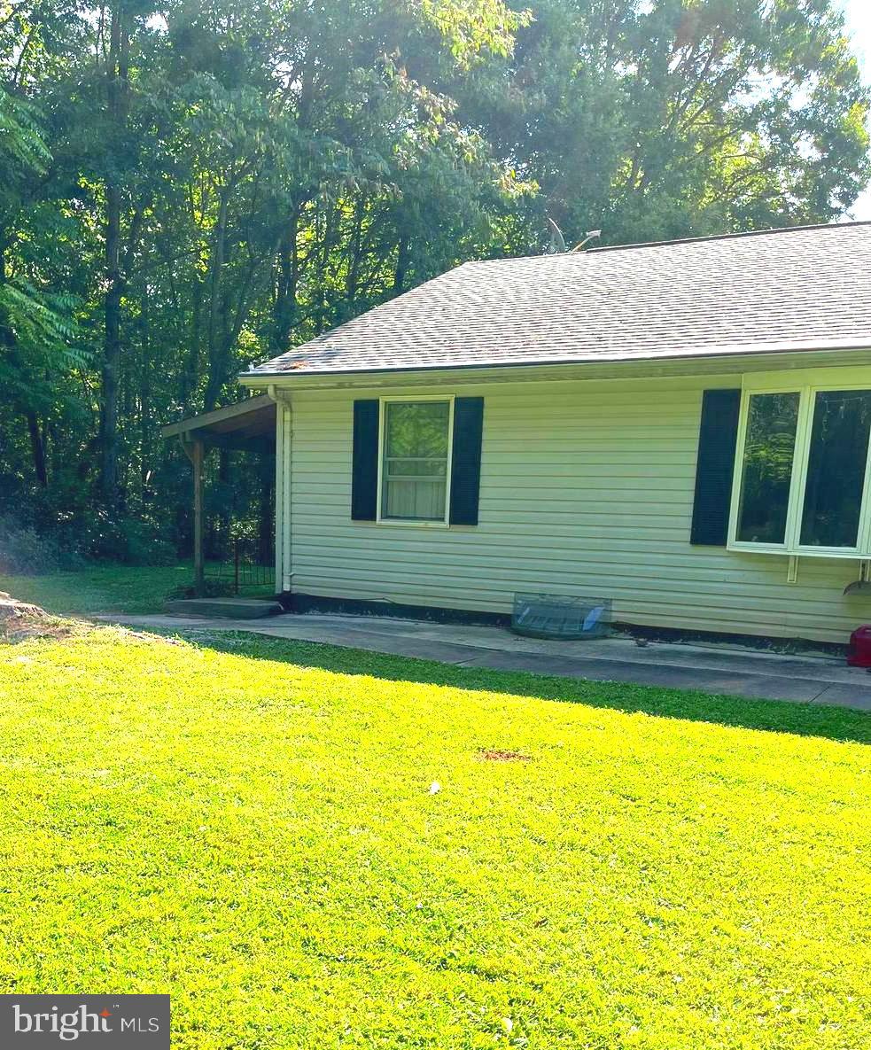 Basement Apartment (roughly 1,000 sqft) featureing a large living room; spacious eat-in kitchen; 2 bedrooms and one flex room that could be an office/den.