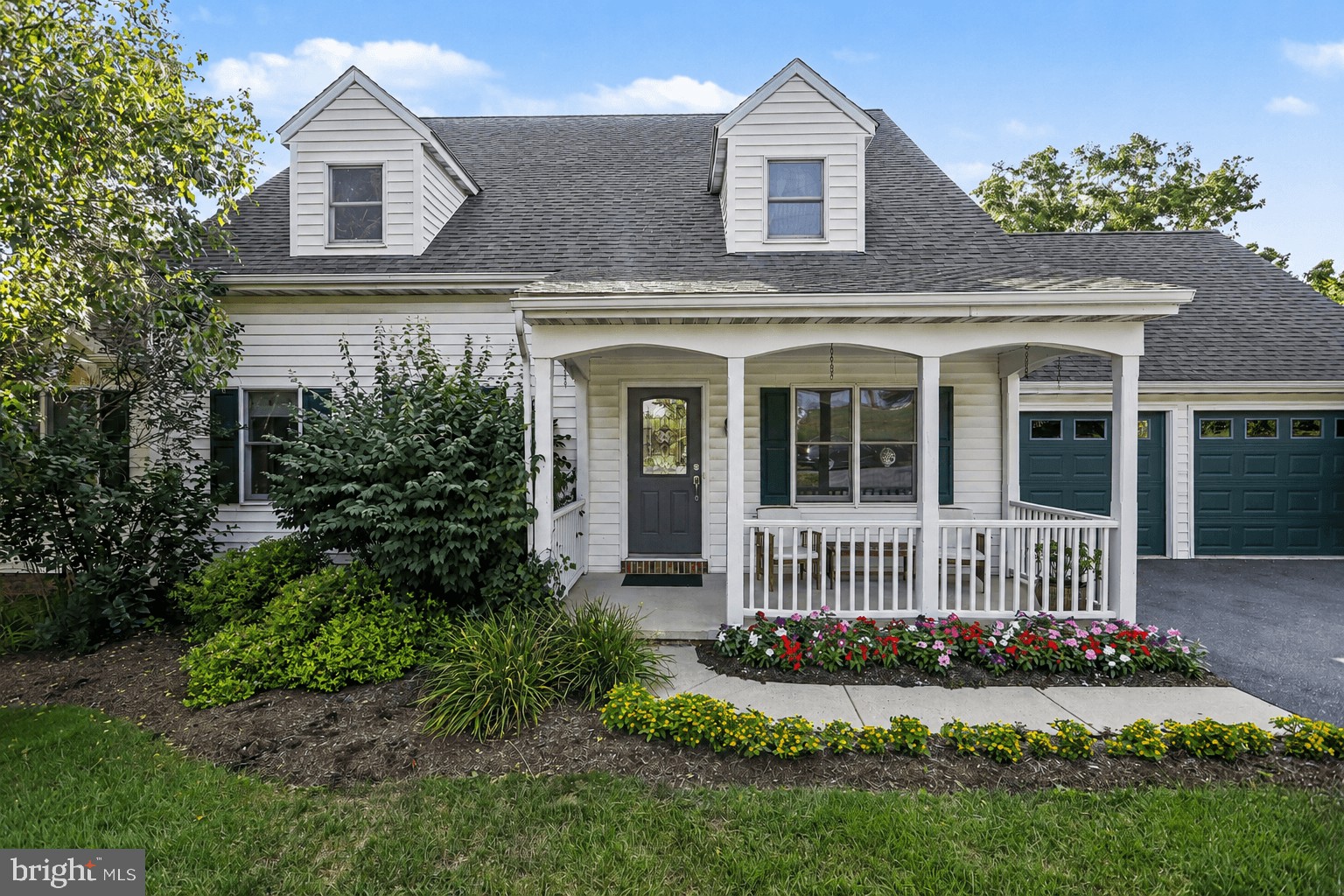 Welcome to this beautifully maintained 4-bedroom, 3-bath Cape Cod nestled in Warwick Twp (Lititz). From the inviting covered front porch to the thoughtfully designed interior, this home offers the perfect blend of comfort, style, and functionality.Step inside to the welcoming sitting room boasting lots of natural light, flowing right into the kitchen and dining area with hardwood floors extending throughout much of the main level.  The kitchen features granite countertops, a tile backsplash, and ample cabinetry,  Just beyond the dining area, the large family room boasts vaulted ceilings with skylights offering abundant natural light, and peaceful views of the private backyard.
The spacious first-floor primary suite provides a relaxing retreat with vaulted ceilings, a luxurious en-suite bath featuring a Jacuzzi tub, tile shower, and double vanity. An additional full bathroom on the main level adds flexibility for guests. Upstairs, you’ll find three generously sized bedrooms, a full bath, and the convenience of a second-floor laundry. Outside, enjoy the privacy of the backyard from the expansive multi-level deck and patio—perfect for entertaining or unwinding. A two-car attached garage is complemented by a built-in storage shed just off the rear of the home, providing plenty of room for lawn equipment, tools, and outdoor gear.
Conveniently located just minutes from downtown Lititz, this exceptional home combines spacious living with the charm and convenience of one of Lancaster County’s most sought-after communities.
