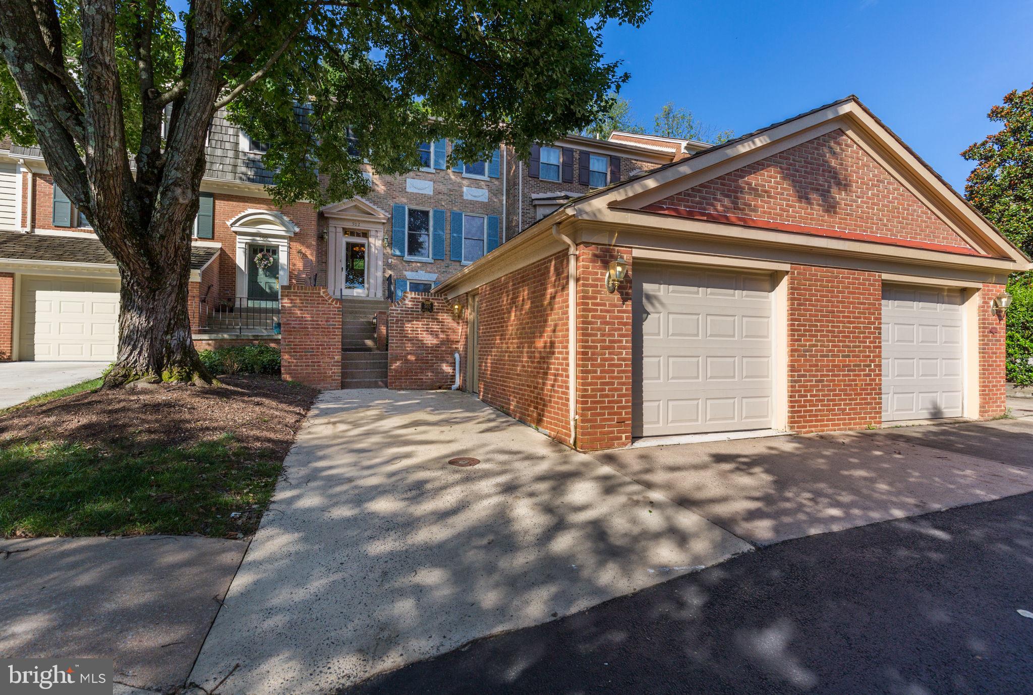 Prime Location! Close to Everything! This stunning and spacious townhome features 4 bedrooms and 3.5 bathrooms, offering ample space and comfort. The main level boasts elegant formal living and dining rooms, a gourmet kitchen with stainless steel appliances, and a cozy fireplace that opens to a bright breakfast area. A convenient half bath is also on this level. Upstairs, you’ll find 3 bedrooms and 2 full bathrooms, including a primary suite with a private bath. The other two bedrooms are generously sized and share the second full bath. The home includes three finished levels, with a fully finished basement featuring a fireplace, a bedroom suite, and an entertainment room that leads to a charming patio. The fenced backyard provides both privacy and a peaceful view of the woods. Additional highlights include a one-car garage, a front patio, fresh paint throughout, new carpet on the upper level, and new kitchen flooring. Conveniently located within walking distance to shops, restaurants, and bus services, and just 2 miles from Tysons Corner. Situated in the highly sought-after Madison High School Pyramid.