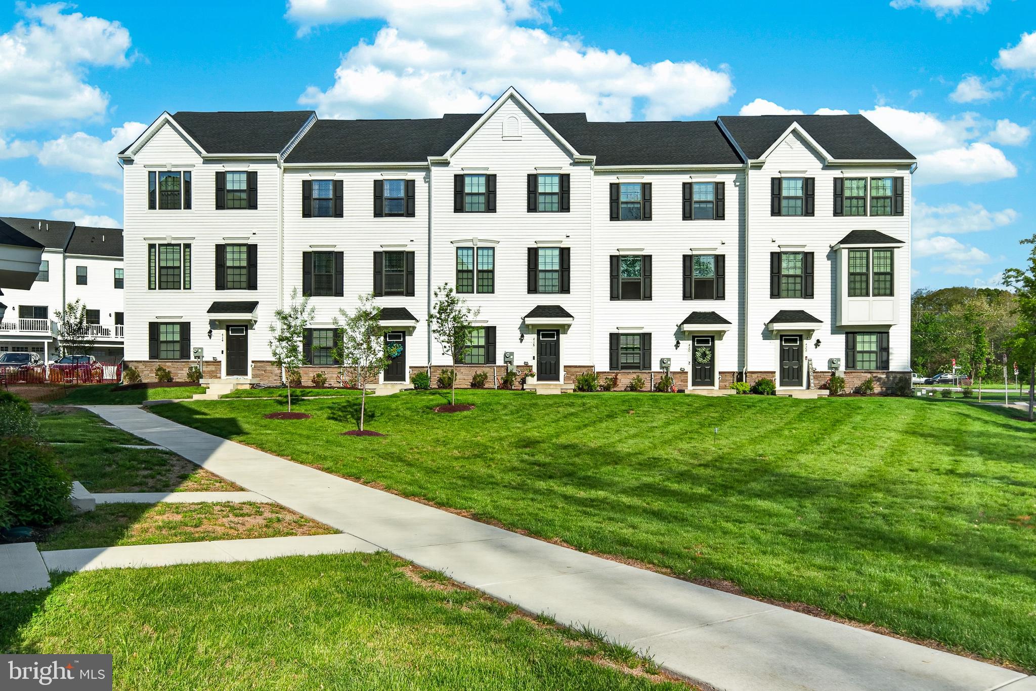 Welcome to this almost new 2024-built luxury townhome in the highly sought-after Exton Walk community, situated within the award-winning West Chester Area School District.
Offering approximately 2,120 square feet of finished living space across three floors, this exceptional Strauss-model home features 3 spacious bedrooms, 3.5 bathrooms, and an open-concept floor plan ideal for entertaining and everyday living. Bright, airy interiors filled with natural light and contemporary finishes make every level feel welcoming and refined.
What truly sets this home apart is the entry level, which features a unique builder-customized open living space with a full bathroom. This layout was a paid custom modification during construction and exists nowhere else in Exton Walk, making this a genuinely one-of-a-kind home in the community.
Luxury vinyl plank flooring runs throughout the first and second floors, all staircases, and every bathroom, with carpet reserved only for the third floor bedrooms and closets. The gourmet kitchen features a smart GE 5-burner induction range, smart GE dishwasher, large three-door refrigerator, generous cabinetry, pantry, and a beautiful white hutch with glass display cabinets, flowing seamlessly into the dining and living areas, creating the perfect setting for gatherings and family time. A full-sized deck extends the entertaining space outdoors. The primary suite offers a walk-in closet and spa-inspired bathroom designed for ultimate relaxation, with two additional bedrooms and a full hall bathroom completing the upper level.
Upgraded Whirlpool washer and dryer included. Smart garage access via the Aladdin app. Four dedicated parking spots, 2 in the garage and 2 under the deck. Community playground just two doors away with guest parking nearby.
Minutes from Route 30, Route 100, and the PA Turnpike, with nearby train stations making commutes effortless along with shopping, dining, parks and entertainment all close by. Please schedule the visit today