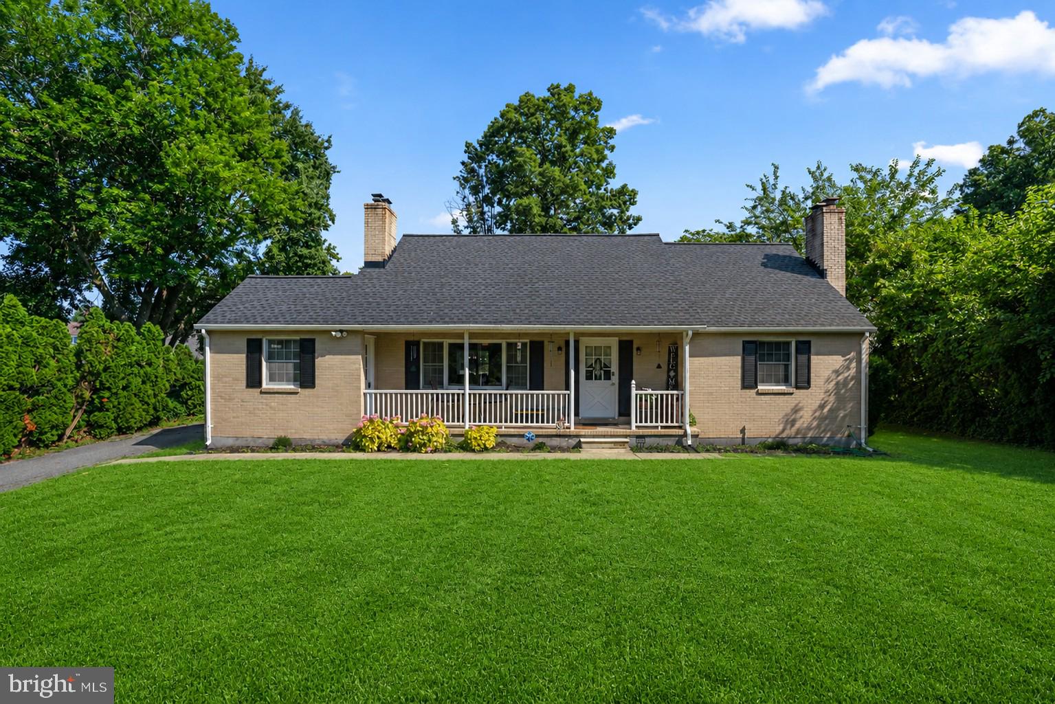 Situated on nearly an acre at the end of a private lane, this well-built classic home offers a peaceful, private setting with the perfect balance of country living and convenient access to in-town amenities. Meticulously maintained and thoughtfully updated, the home features a new 50-year roof installed in 2024, a new water heater, and has been freshly painted inside and out.
Inside, you’ll find hardwood floors throughout the main living areas and bedrooms, along with fireplaces in both the living room and the lower-level family room, adding warmth and character. Recent updates include recessed lighting, ceiling fans for improved airflow, and new air conditioning for year-round comfort. The kitchen and bathrooms feature new flooring, and both bathrooms have been updated with new fixtures and lighting for a fresh, modern feel. The kitchen also boasts newer appliances.The oversized lower-level family room offers newly installed carpet, a bar area, and a cozy wood-burning fireplace—perfect for entertaining or relaxing. Additional features include a large storage area and a convenient walk-out entrance to the exterior.
With its serene surroundings, quality construction, and extensive updates, this home is truly move-in ready and offers a rare combination of privacy, comfort, and convenience.