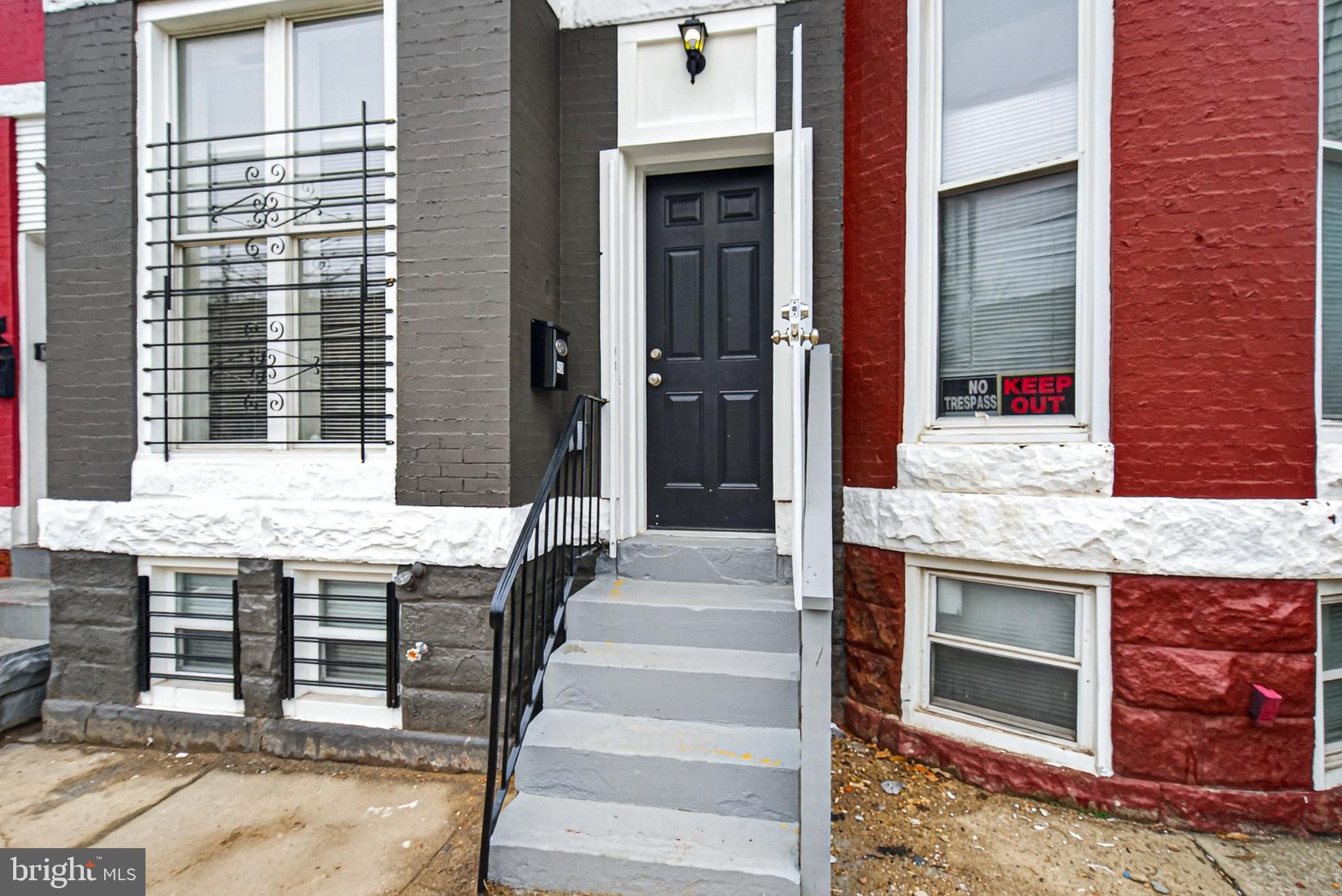 If you are looking to live in Baltimore city in a fully renovated home, this beautiful townhome located at Mount Clare neighborhood is now available. Conveniently located within approximately one mile of Carroll Park and the Westside Shopping Center, with easy access to major traffic including S. Monroe Street and Wilkens Avenue. This three-level home offers 5 bedrooms and 3 full bathrooms, providing plenty of space and flexibility. The main level features a bright open-concept layout highlighted by a stylish accent wall and a brand-new kitchen complete with a modern peninsula, quartz countertops, stainless steel appliances, custom backsplash, recessed lighting, and contemporary finishes throughout. The upper level offers three bedrooms, balcony, this level includes a primary suite with a private full bathroom for added comfort and privacy. The fully finished lower level provides additional living space with two nicely sized bedrooms, a full bathroom, and washer and dryer included. This move-in-ready home combines modern updates with a convenient city location, making it a great opportunity for homeowners or investors alike. Schedule your showing today!
