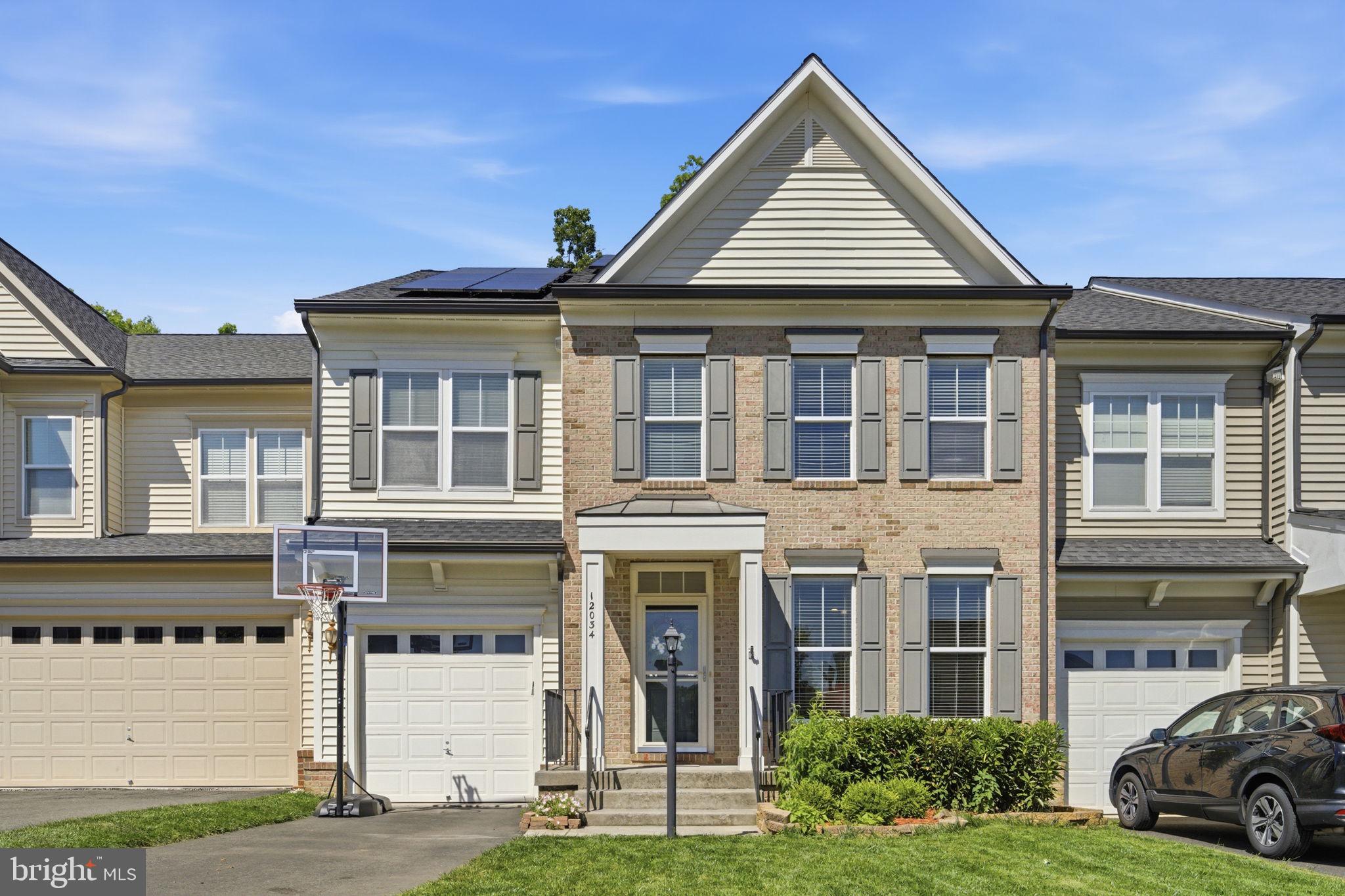 Welcome to this beautifully maintained and updated 4-bedroom, 3.5-bath townhouse located in the highly desirable Pembroke community in Bristow. This spacious home offers over 3,200 square feet of living space with a fully finished walk-out basement and a bright open floor plan perfect for everyday living and entertaining.

The main level features updated flooring, recessed lighting, spacious living and dining areas, and a well-appointed kitchen with ample cabinet space, center island, and modern appliances. Upstairs you will find generously sized bedrooms including a large primary suite with walk-in closet and private bath.

The fully finished basement provides additional living space ideal for a recreation room, home office, gym, or guest area. Recent upgrades include newer flooring, newer carpet, and a replaced roof, giving peace of mind to the next owner.

Energy-efficient solar panels help reduce utility costs. Conveniently located close to top-rated Prince William County schools, shopping centers, restaurants, parks, walking trails, and major commuter routes.

Community amenities include swimming pool, playgrounds, basketball courts, tennis courts, bike trails, jogging/walking paths, and community common areas.

Move-in ready and a must see!