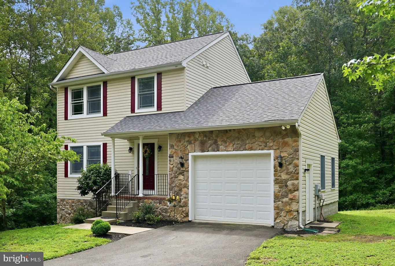 Welcome to 9295 Ivy Hill Loop, where privacy, comfort, and exceptional value come together on a picturesque 3.1-acre homesite. Thoughtfully maintained and beautifully cared for, this property showcases true pride of ownership throughout and offers the perfect blend of peaceful country living and modern convenience.

Recent improvements provide peace of mind and make this home an outstanding opportunity for today's buyers, including a new roof (2026), HVAC system just over two years old, updated main-level flooring within the past five years, and brand-new carpeting in the lower level, new paver walk to basement and refurbished rear deck. These significant upgrades allow you to move in and enjoy from day one.

Ideally located in the heart of King George County, you'll enjoy easy access to some of the region's most popular destinations, including Caledon State Park, Colonial Beach, Belle Grove Plantation, White Hall Vineyards, and Historic Fredericksburg. Commuters will appreciate the close proximity to Naval Support Facility Dahlgren and a convenient drive to Fort A.P. Hill.

Enjoy the charm of rural living without sacrificing convenience, with shopping, dining, and everyday services just minutes away in the King George Station area. Well-maintained homes with this combination of acreage, updates, location, and value are increasingly hard to find.