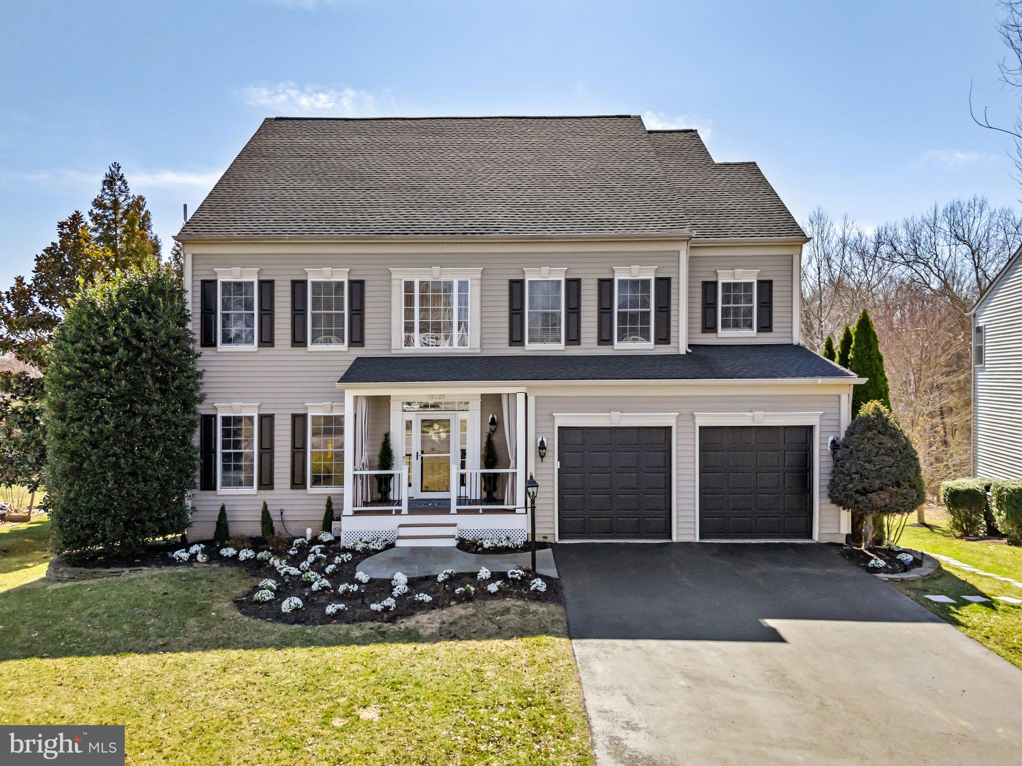 IMMACULATE and NEWLY RENOVATED 6BR/6BA PROPERTY on PREMIUM and PRIVATE Lot Backing to TREE CONSERVATION EASEMENT and Little Bull Run Creek. THIS 4-LEVEL HOME IS an entertainer’s dream.  Perfect for large multi-generational families and LOADED w/ APPROX $200K in RECENT UPGRADES.  The THREE STORY foyer welcomes guests to the main level and staircases. As you enter the main level of the home, 10-12ft ceilings provide a feeling of SCALE and GRANDEUR. Beautifully finished hardwood flooring is featured throughout the home. New paint throughout and NEW UPSCALE TOUCH SENSOR and Custom Lighting (2024) is installed in every room to create a modern and UPDATED VIBE.  The Main Level includes a cozy Living Room with morning light, a Formal Dining Room with large bay window and CUSTOM molding in addition to a large Pottery Barn Crystal Chandelier. A private office has large windows w/ built-ins and French doors.  The light drenched Great Room includes 12 foot windows, natural stone gas fireplace, built-in bookshelf, recessed lighting and updated pendant lighting.  The Great Room is OPEN to the newly REMODELED Kitchen and to the covered outdoor living space. A complete kitchen renovation (2024) created a gracious gathering space for family and friends with a custom 12ft QUARTZ kitchen island that provides seating. The kitchen also features a COFFEE BAR with both wine and beverage refrigerators beneath custom open shelving. High tech, smart appliances and a custom Kitchen Pantry make this a true chef’s kitchen. The main level is completed by a large CUSTOM Mudroom with extended cabinetry and bench seating and an UPDATED Powder Room (2024).  The SECOND-Level Living Quarters feature an EXQUISITE PRIMARY Bedroom that overlooks the private backyard, tray ceiling with recessed lighting, newer carpet over hardwood floors, 3-sided gas fireplace with stone framing, light-filled sitting area with built-in desk, 2 custom walk-in-closets plus additional closet for storage.  A LUXURIOUS Private Bath features separate shower, soaking tub, dual quartz topped vanity and water closet. Three generously sized bedrooms include a Princess Suite with en-suite and newly RENOVATED bath that features a custom tiled marble shower with frameless glass door. Two additional bedrooms have newly RENOVATED closets, new carpet over hardwood and built in desk.  1 of 2 Laundry Suites located on Bedroom level. A beautifully finished LOFT LEVEL includes a large 5th Bedroom with oversized closets.  A convenient full bath is outside the bedroom and accessible to the Large FLEX Living Space - perfect for Media or Gaming Room. The FINISHED walk-out LOWER-LEVEL CHECKS all the BOXES.  The Lower level provides a large Entertainment space anchored by a GORGEOUS Imported Stone Mantle surrounding the newly installed Gas FIREPLACE.  The Lower level has a wet bar with dishwasher, quartz countertops and bar seating. The lower level is completed by a  6th Bedroom with patio and backyard views . The bedroom is next to the UPDATED Marble Tiled Full Bath that offers Heated Marble Tiled Floors. Large additional storage room completes the lower level’s indoor space.  Convenient 2nd laundry machines on LL.  Beautiful patio provides additional outdoor living space on the lower level. The covered lower-level patio is hardwired for a hot tub.  Buyer PEACE-of-MIND – Inspection Results Available.  Roof (2018), New Central Vac (2023),  A/C (2024), 2 New EV Charge Ports Runs (2024), New Insulated Garage Doors & Openers (2021), Newly refinished epoxy garage floor (2024), 7-Zone Irrigation System, 2 Solar Powered Attic Fans, Invisible Fence and SO MUCH MORE!  Haymarket's DESIRABLE TWIN BRANCH offers LOW MONTHLY HOA FEES.  Desirable  Battlefield HS School pyramid! Close proximity to UVA’s Haymarket Medical Center,  Shopping/Restaurants, Music Venues, Wineries/Breweries, DC Bus Service, Commuter Lots, and I-66!