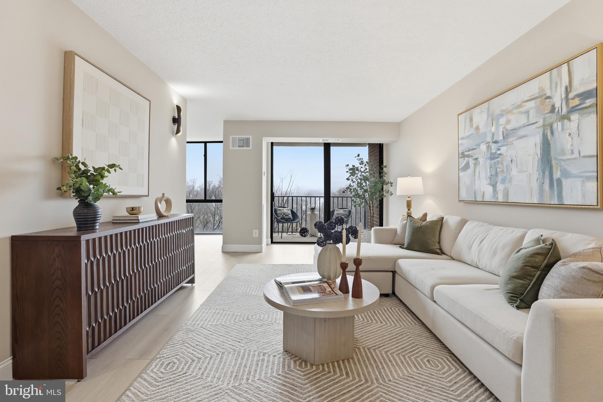 This stunning condominium has been completely reimagined by Renowned Northern Virginia builder, blending luxurious French-inspired accents with top-tier modern upgrades. From the moment you step inside, you'll notice the impeccable attention to detail: brand-new 7-inch luxury vinyl plank flooring throughout, fresh paint, new molding, new doors, new air vents, and a sleek new thermostat. The spacious living area opens to a large SOUTH-FACING balcony—ideal for soaking up natural light and perfect for feng shui design enthusiasts. Floor-to-ceiling windows and a sliding door flood the home with sunshine, creating a warm and inviting atmosphere.

The chef’s dream kitchen is a showstopper, featuring a stunning quartz island with waterfall edges and a chestnut wood acoustic panel that doubles as a desk or extra seating space for gatherings. You'll find all-new LG ® appliances, including a stove, microwave, refrigerator with water filter, dishwasher, and wine rack. The new cabinets, hardware, light fixtures, and sink with a modern faucet and soap dispenser complete this culinary haven.

Down the hallway, you'll find a brand-new washer and dryer, leading to a fully renovated spa-like bathroom that offers a true retreat. The generously sized bedroom is designed for comfort and can easily accommodate a king-sized bed.

This move-in-ready condominium also comes with an impressive list of amenities: a swimming pool, fitness center, tennis courts, party room, and much more. The $829.10 monthly condo fee includes water, electricity, and gas, and residents enjoy the convenience of a parking decal, additional storage (A- 531), and a secured FOB entry system with 24/7 concierge service for peace of mind.

Centrally located, this property offers unbeatable access to the best of Northern Virginia and the D.C. metro area. It's just 10 minutes from the West Falls Church Metro Station, 5 minutes to Trader Joe’s, and 4 minutes to Starbucks, with nearby EV charging stations and countless dining and shopping options, including Tysons, Mosaic District, and Arlington.

This condominium isn't just a home—it’s a lifestyle upgrade waiting for you!