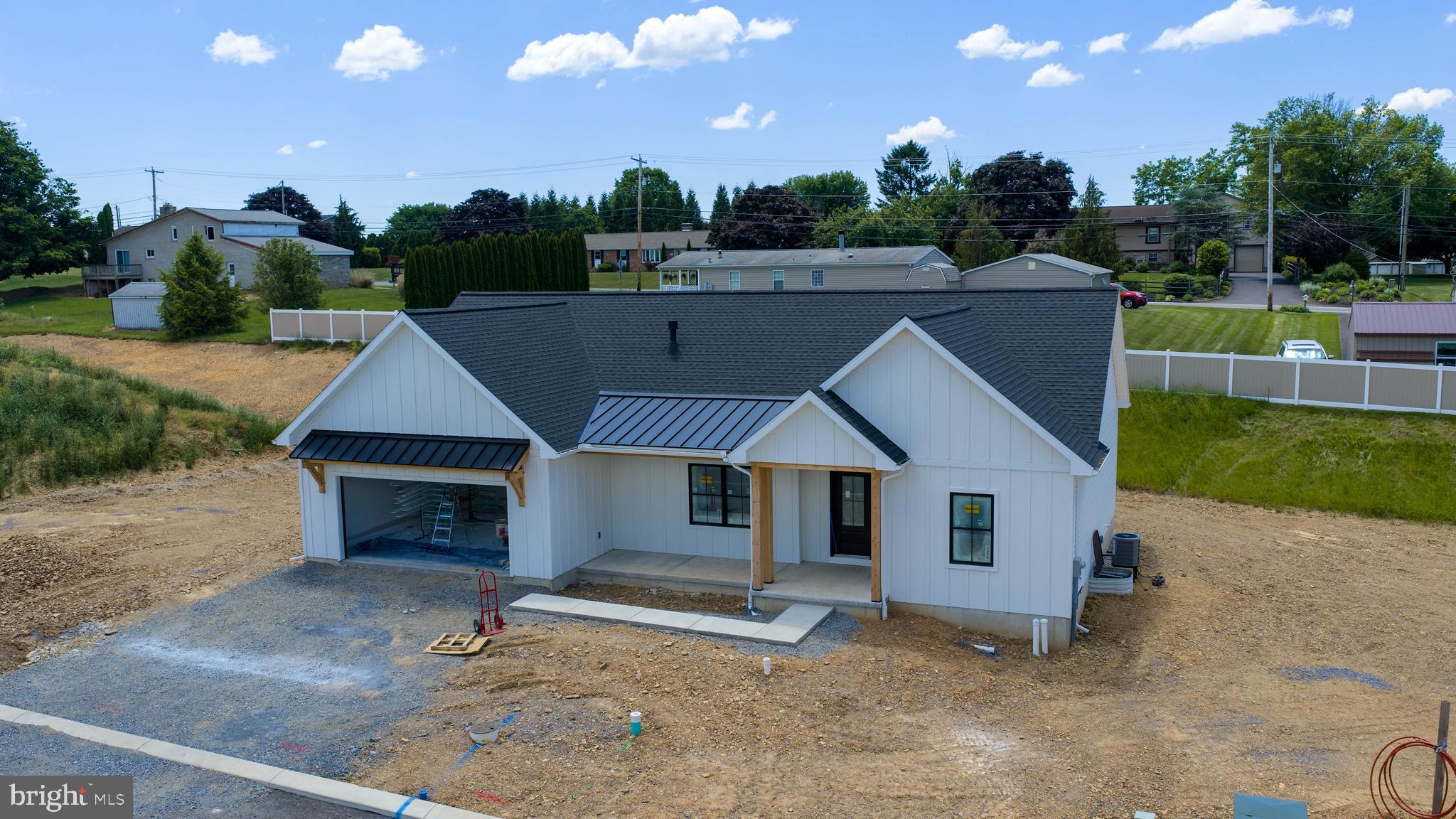 Welcome to Cornerstone Commons—Myerstown’s Newest Neighborhood!
If you've been dreaming of a peaceful lifestyle surrounded by beautiful Lebanon County countryside, this brand-new ranch home on Lot #3 is the one you’ve been waiting for! Currently under construction by Cornerstone Woodworks LLC, this home is being built with top-tier craftsmanship, high-quality materials, and the kind of care that has earned this local builder flawless 5-star reviews. It is tucked away in a quiet new cul-de-sac street that will eventually have just 18 homes, giving you a chance to move in early and help shape a wonderful, close-knit community.

With a beautiful modern farmhouse exterior and a welcoming covered front porch, this home is designed to fit your lifestyle, whether you're raising a family, working from home, or looking to downsize to single-level living. The front door opens into a massive, open-concept Great Room that flows naturally into the Dining Area and a gorgeous Kitchen. It’s the perfect setup for relaxing family evenings, holiday dinners, and entertaining friends. The main bedroom is quietly tucked away on its own side of the house. It features a huge walk-in closet and a private bathroom with a walk-in shower. On the opposite side of the home, you’ll find two more bright, generous bedrooms and a second full bathroom—perfect for kids' rooms, overnight guests, or a dedicated home office. The home includes a main-level laundry room located right off the spacious 2-car garage. Step outside the dining area to your private back patio, where you can grill, relax, and take in the beautiful country sunsets. The high standards of construction show from the ground up. The home features a huge, open basement with 8-foot poured concrete walls and high-efficiency R10 insulation. Leave it as-is for an incredible workshop and endless storage, or finish it down the road into the ultimate game room, home gym, or kids' play area!

Myerstown offers a safe, friendly small-town feel surrounded by rolling farmland, while still keeping you incredibly close to everything you need. Grab a classic homestyle breakfast at Country Fare Restaurant, or head out for a fun dinner on the patio at DoGood’s Tavern. For your everyday essentials, the beloved Dutch-Way Farm Market is just down the road, packed with fresh, locally sourced groceries and amazing baked goods. From peaceful neighborhood walks and local golfing to antiquing and community events, there is always a way to unwind. Plus, you’re just a short drive from the bigger city conveniences of Lebanon, Hershey, and Lancaster. For families, this home sits in the highly respected Eastern Lebanon County (ELCO) School District, celebrated for its strong community involvement, excellent athletic programs, and great student-to-teacher ratios.

Don’t miss your chance to own a beautiful, brand-new home built by a local team you can truly trust. Reach out today to look over the floor plans and take a walk around the lot!